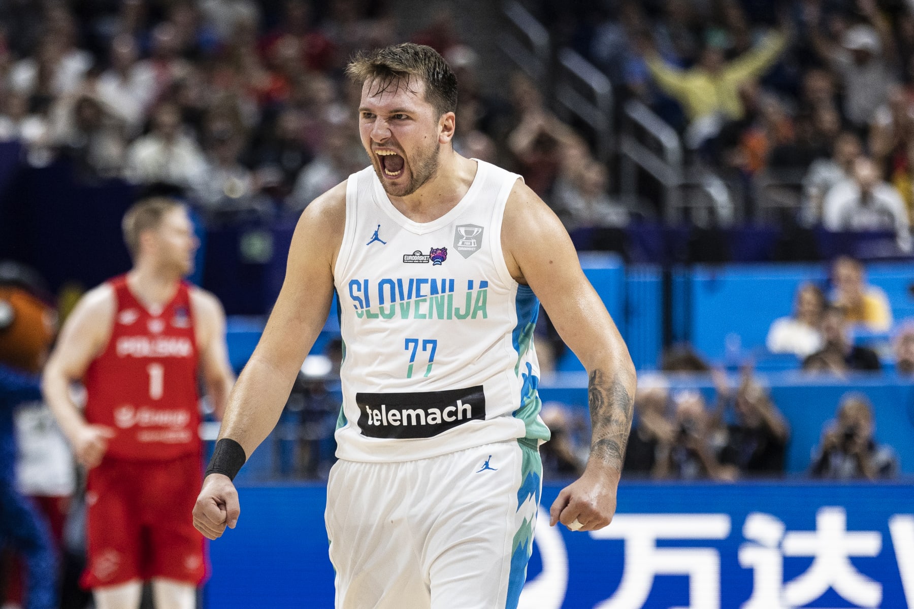 BERLIN, GERMANY - SEPTEMBER 14: Luka Doncic celebrates   during the FIBA EuroBasket 2022 quarterfinal  match between Slovenia v Poland at EuroBasket Arena Berlin on September 14, 2022 in Berlin, Germany. (Photo by Maja Hitij/Getty Images)