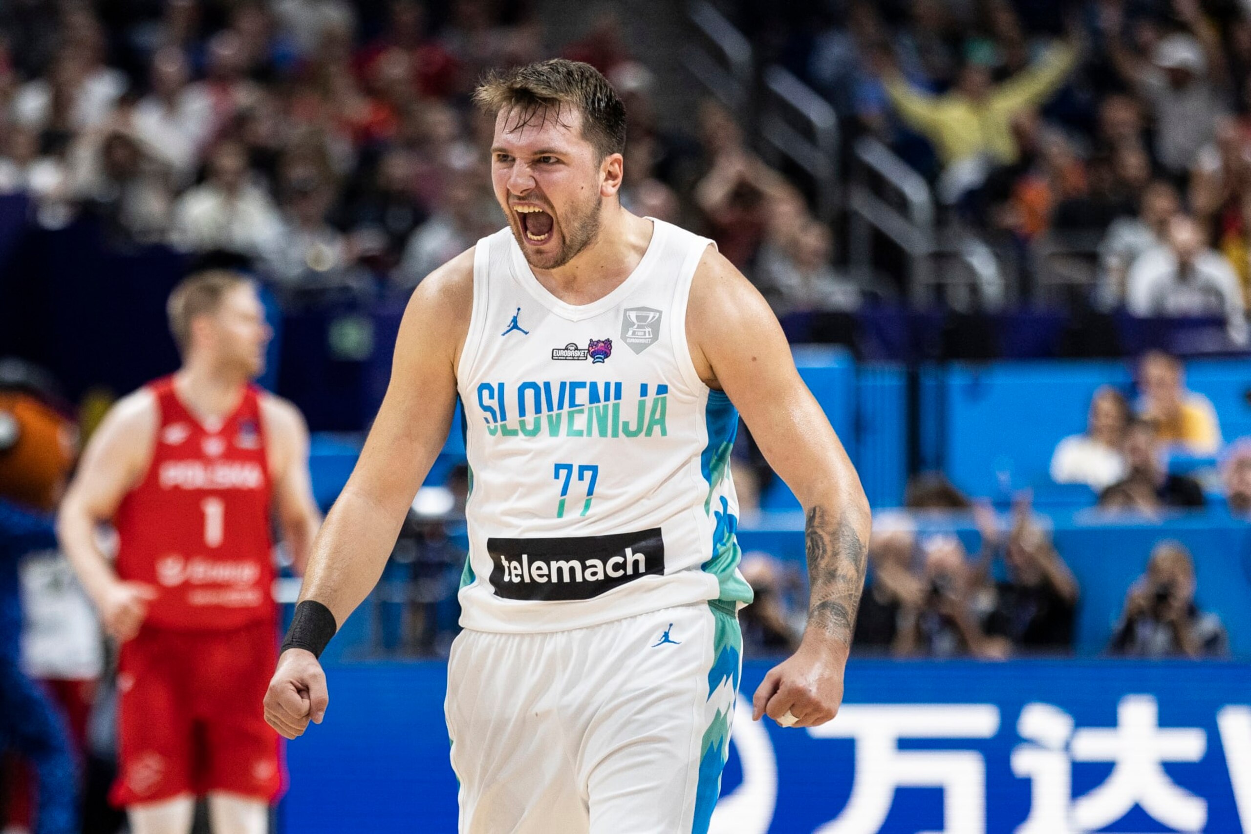BERLIN, GERMANY - SEPTEMBER 14: Luka Doncic celebrates   during the FIBA EuroBasket 2022 quarterfinal  match between Slovenia v Poland at EuroBasket Arena Berlin on September 14, 2022 in Berlin, Germany. (Photo by Maja Hitij/Getty Images)