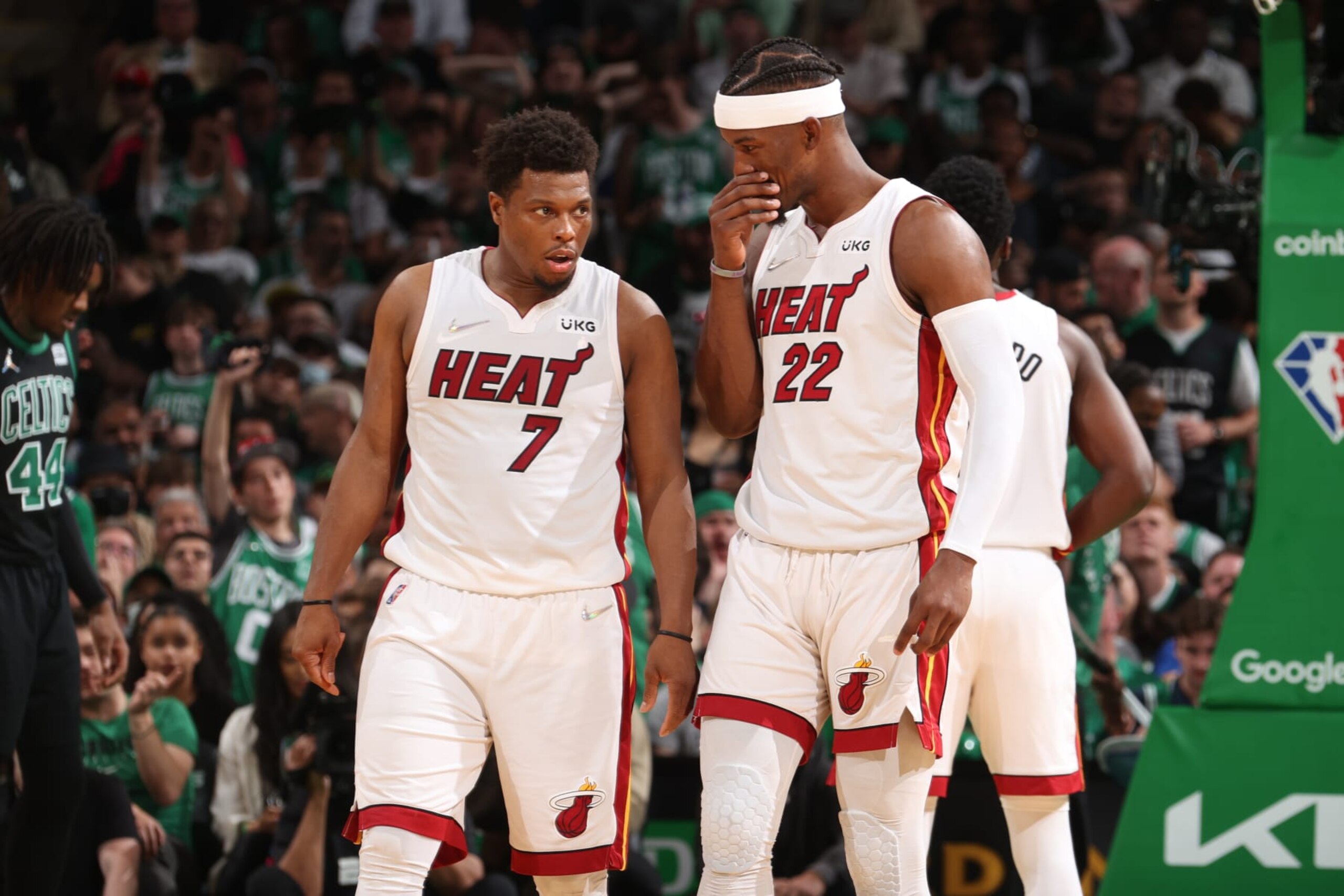 BOSTON, MA - MAY 27: Kyle Lowry #7 talks to Jimmy Butler #22 of the Miami Heat during Game 6 of the 2022 NBA Playoffs Eastern Conference Finals on May 27, 2022 at the TD Garden in Boston, Massachusetts.  NOTE TO USER: User expressly acknowledges and agrees that, by downloading and or using this photograph, User is consenting to the terms and conditions of the Getty Images License Agreement. Mandatory Copyright Notice: Copyright 2022 NBAE  (Photo by Nathaniel S. Butler/NBAE via Getty Images)