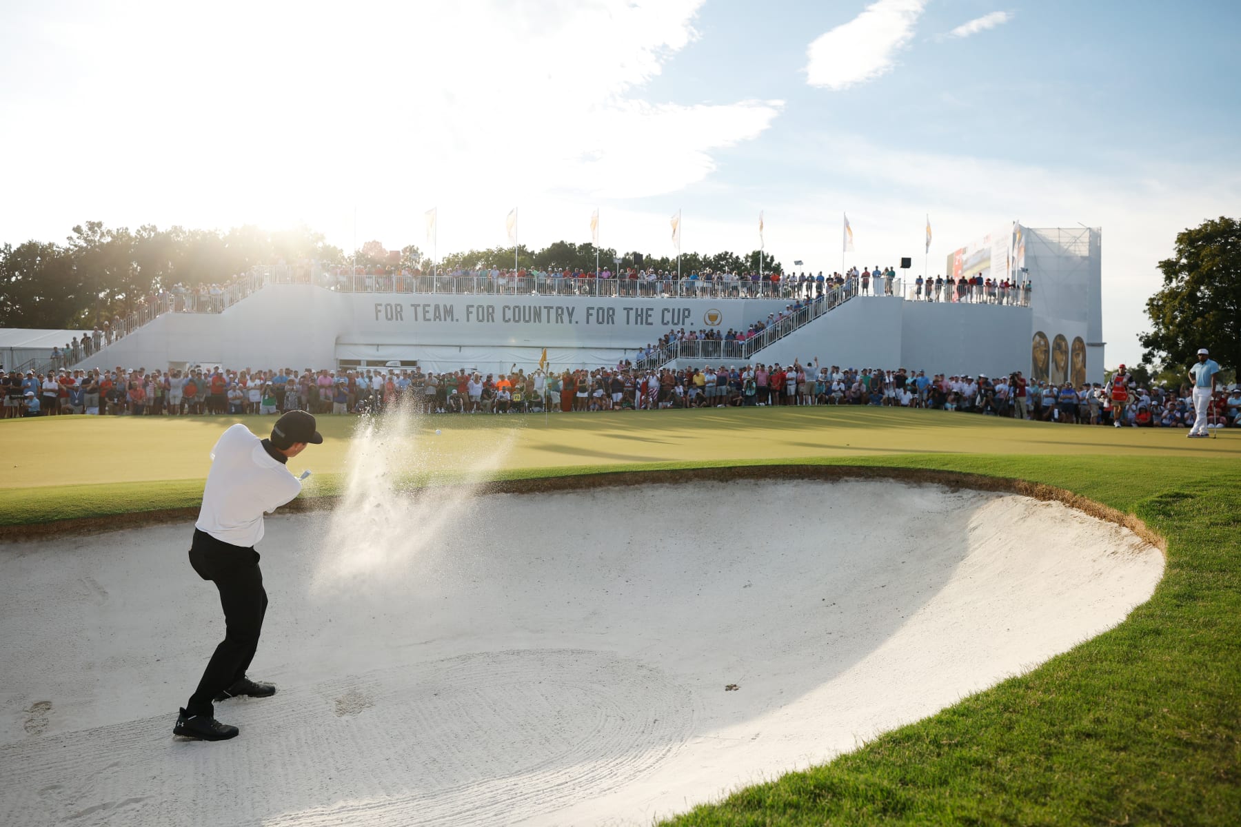 CHARLOTTE, NORTH CAROLINA - SEPTEMBER 22: Mito Pereira of Chile and the International Team plays a shot from a bunker on the 18th hole during the Thursday foursome matches on day one of the 2022 Presidents Cup at Quail Hollow Country Club on September 22, 2022 in Charlotte, North Carolina. (Photo by Jared C. Tilton/Getty Images)