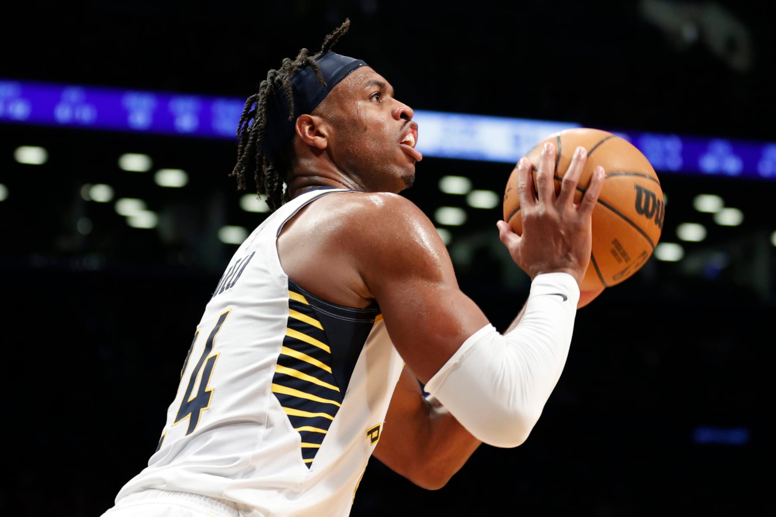 NEW YORK, NEW YORK - APRIL 10: Buddy Hield #24 of the Indiana Pacers shoots the ball during the second half against the Brooklyn Nets at Barclays Center on April 10, 2022 in the Brooklyn borough of New York City. The Nets won 134-126. NOTE TO USER: User expressly acknowledges and agrees that, by downloading and or using this photograph, User is consenting to the terms and conditions of the Getty Images License Agreement. (Photo by Sarah Stier/Getty Images)