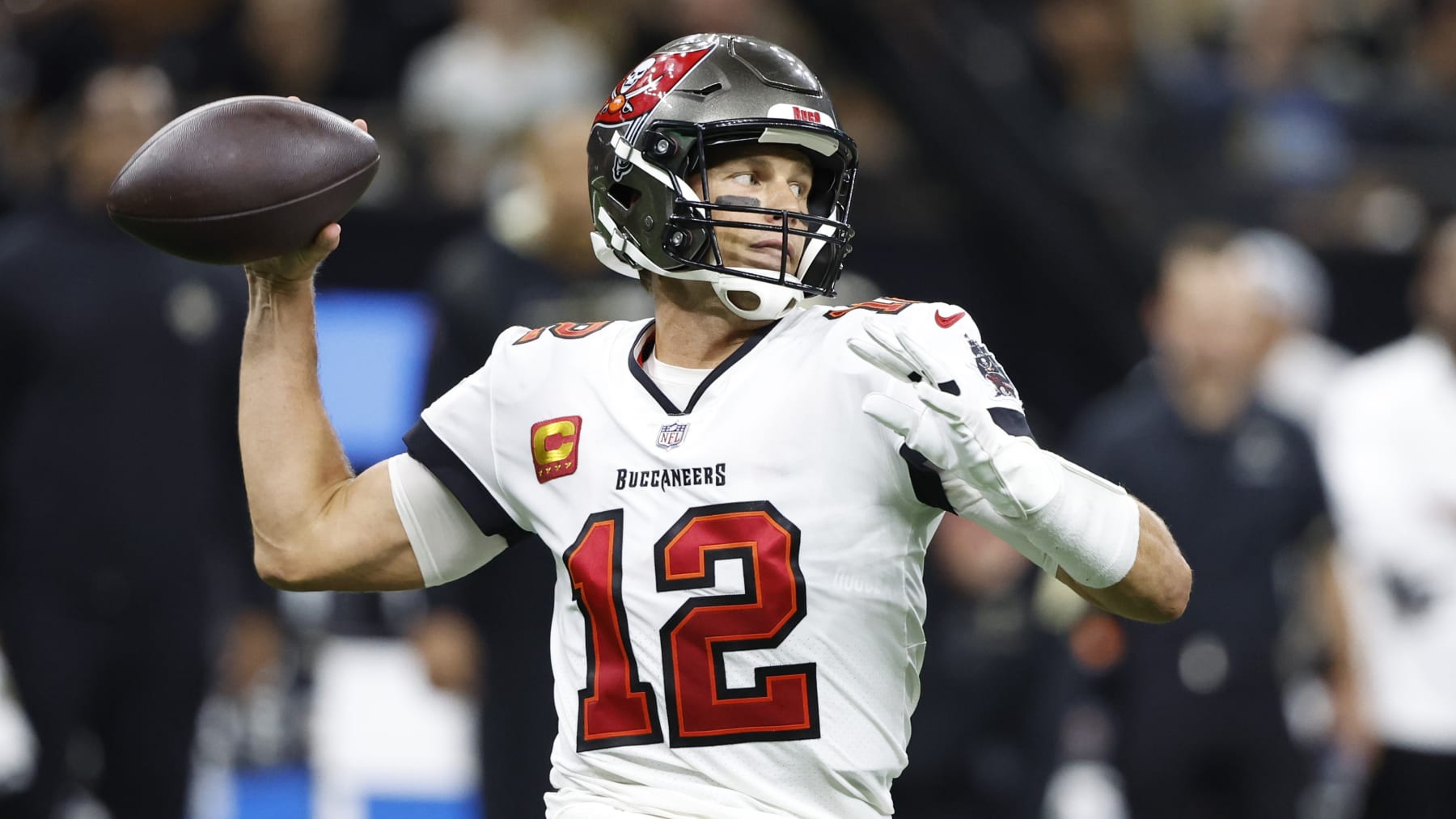 Tampa Bay Buccaneers quarterback Tom Brady passes against the New Orleans Saints during the second half of an NFL football game in New Orleans, Sunday, Sept. 18, 2022. (AP Photo/Butch Dill)