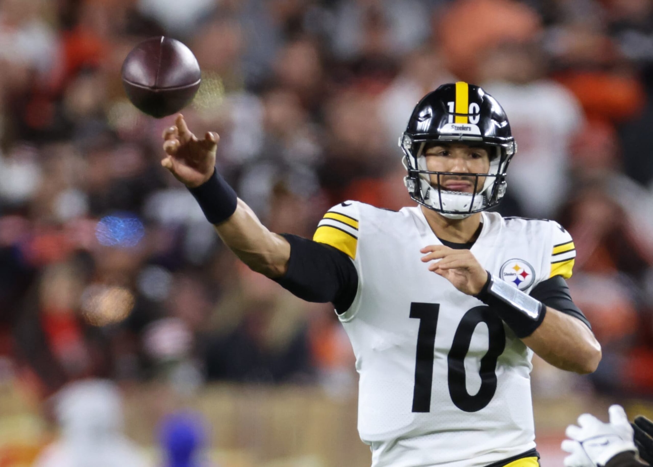 CLEVELAND, OHIO - SEPTEMBER 22: Mitch Trubisky #10 of the Pittsburgh Steelers throws a pass during the first quarter ahead of defender Jeremiah Owusu-Koramoah #28 of the Cleveland Browns at FirstEnergy Stadium on September 22, 2022 in Cleveland, Ohio. (Photo by Gregory Shamus/Getty Images)