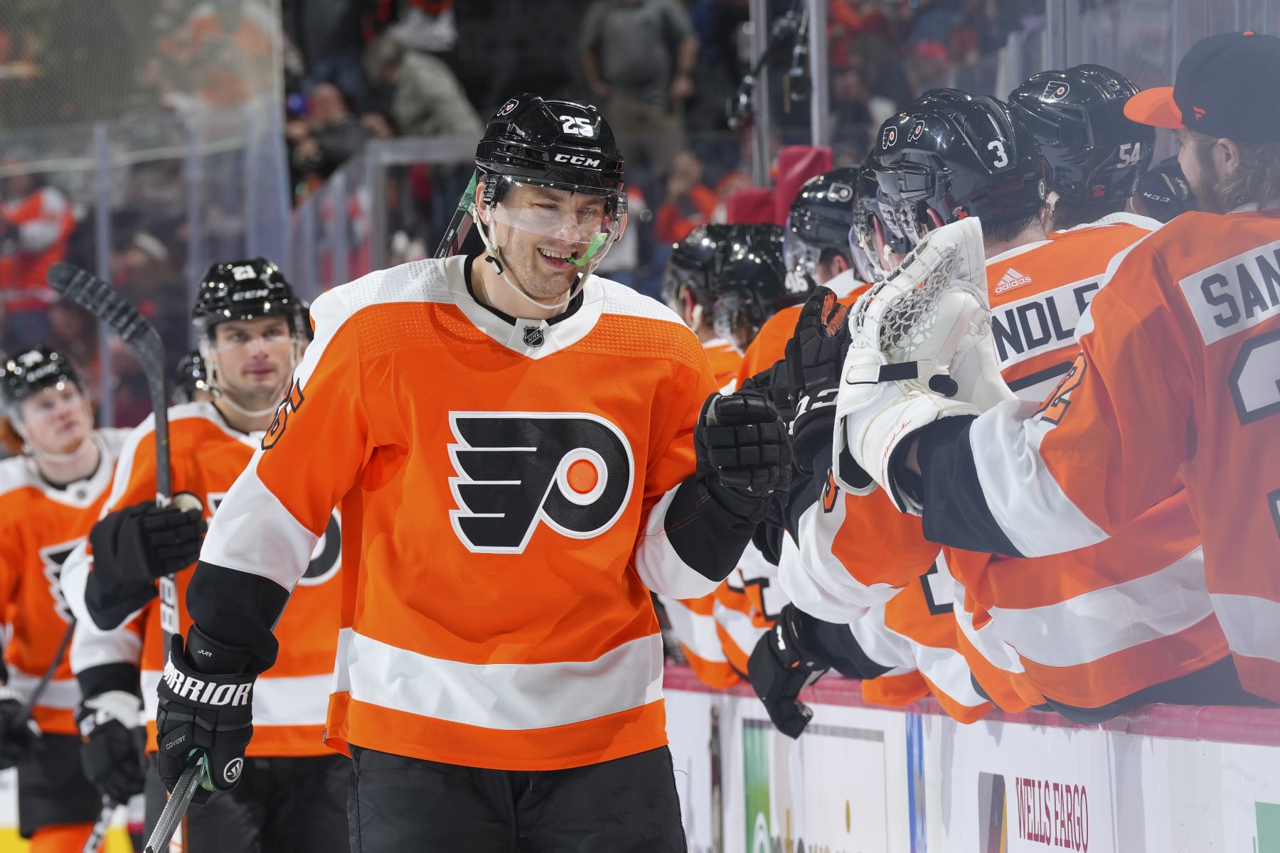 PHILADELPHIA, PA - APRIL 29: James van Riemsdyk #25 of the Philadelphia Flyers celebrates with his teammates on the bench after scoring a goal against the Ottawa Senators in the first period at the Wells Fargo Center on April 29, 2022 in Philadelphia, Pennsylvania. (Photo by Mitchell Leff/Getty Images)
