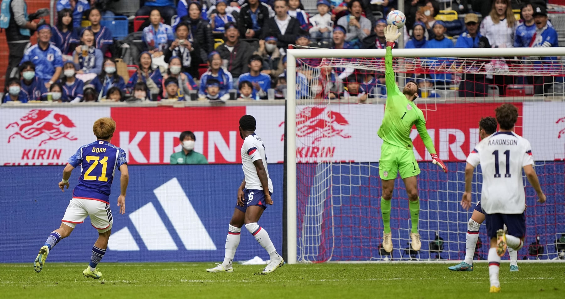 United States goalkeeper Matt Turner saves a ball from Japan's Ritsu Doan during the international friendly soccer match between USA and Japan as part of the Kirin Challenge Cup in Duesseldorf, Germany, Friday, Sept. 23, 2022. (AP Photo/Martin Meissner)