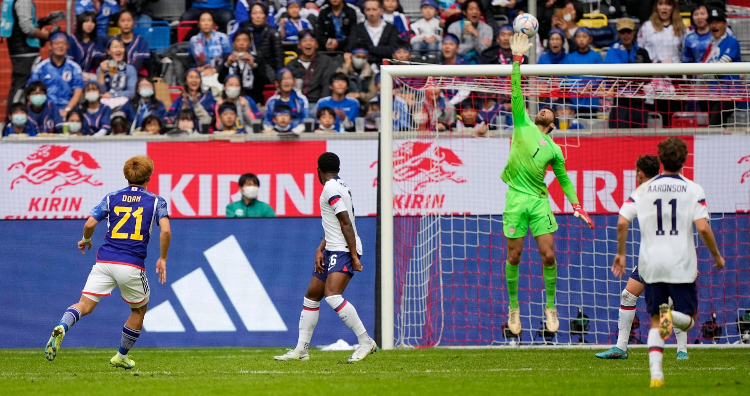 United States goalkeeper Matt Turner saves a ball from Japan's Ritsu Doan during the international friendly soccer match between USA and Japan as part of the Kirin Challenge Cup in Duesseldorf, Germany, Friday, Sept. 23, 2022. (AP Photo/Martin Meissner)