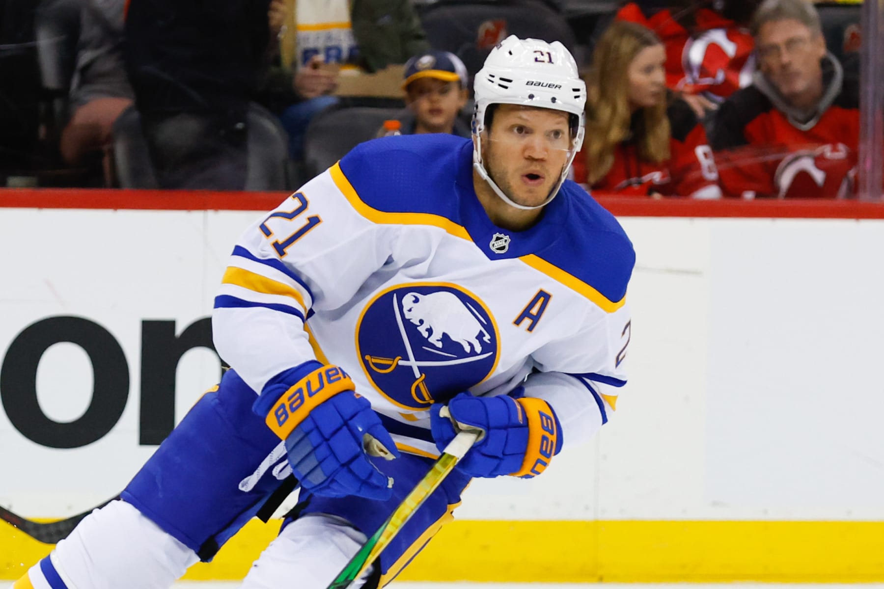 NEWARK, NJ - APRIL 21:  Buffalo Sabres right wing Kyle Okposo (21) skates during the National Hockey League game between the New Jersey Devils and the Buffalo Sabres on April 21, 2022 at the Prudential Center in Newark, New Jersey.  (Photo by Rich Graessle/Icon Sportswire via Getty Images)