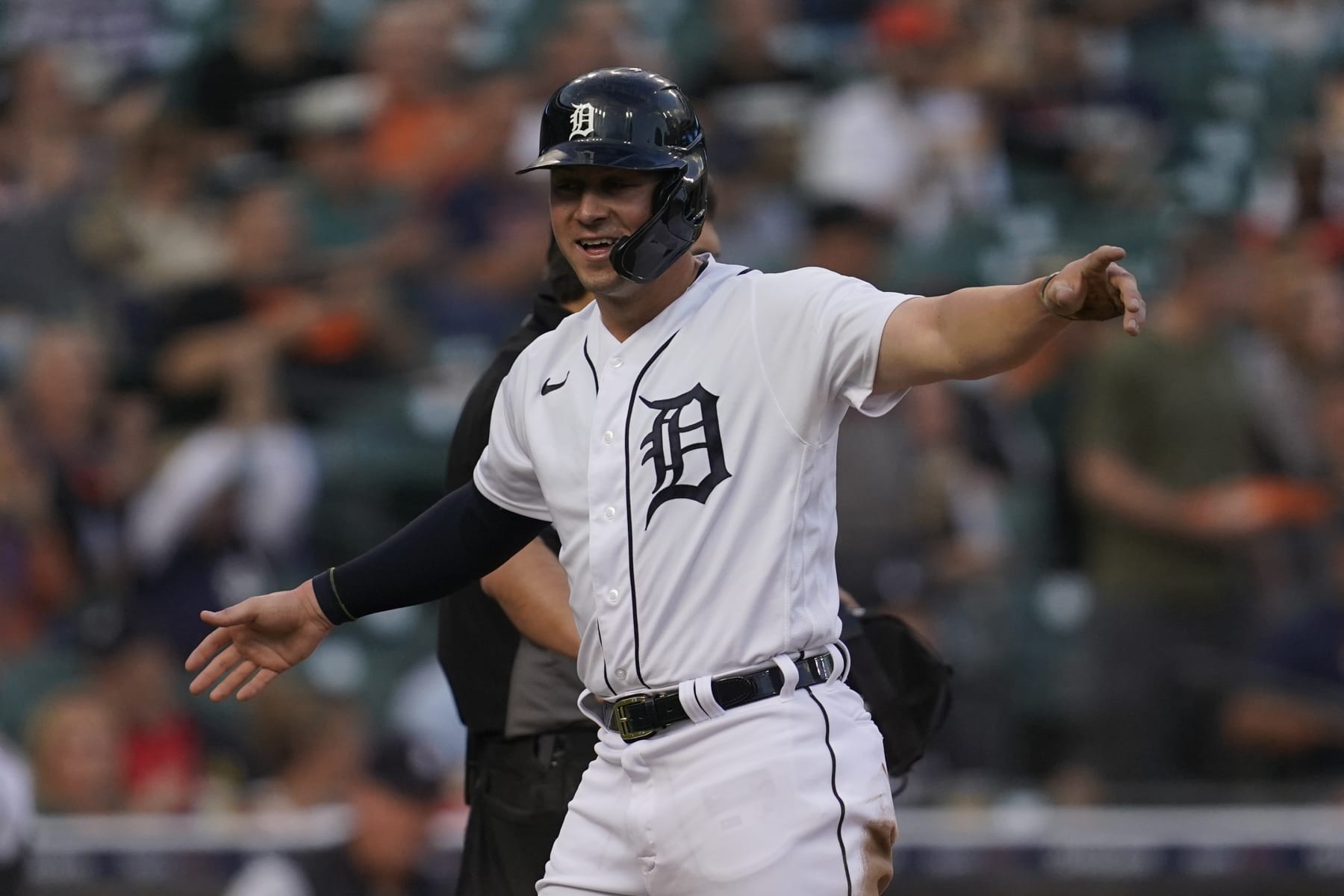 Detroit Tigers' Spencer Torkelson celebrates scoring against the Houston Astros in the second inning of a baseball game in Detroit, Tuesday, Sept. 13, 2022. (AP Photo/Paul Sancya)