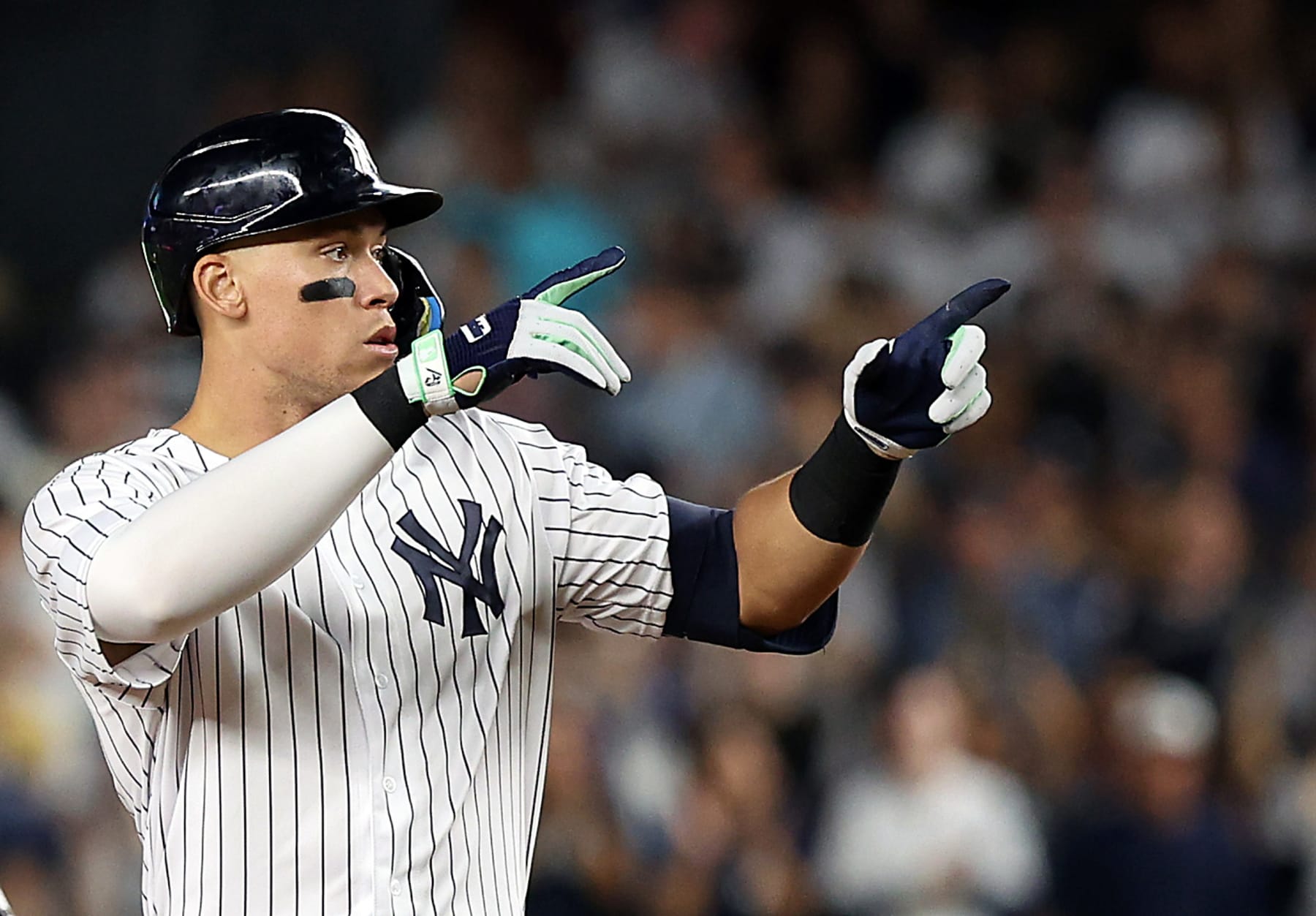NEW YORK, NEW YORK - SEPTEMBER 21:  Aaron Judge #99 of the New York Yankees reacts from second base after hitting a double during the 1st inning of the game against the Pittsburgh Pirates at Yankee Stadium on September 21, 2022 in the Bronx borough of New York City. (Photo by Jamie Squire/Getty Images)