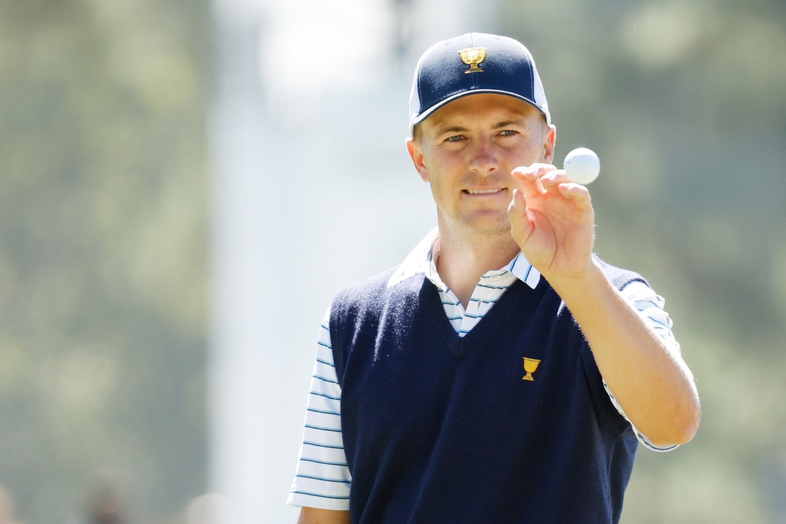 CHARLOTTE, NORTH CAROLINA - SEPTEMBER 23: Jordan Spieth of the United States Team catches a golf ball on the third green during Friday four-ball matches on day two of the 2022 Presidents Cup at Quail Hollow Country Club on September 23, 2022 in Charlotte, North Carolina. (Photo by Jared C. Tilton/Getty Images)