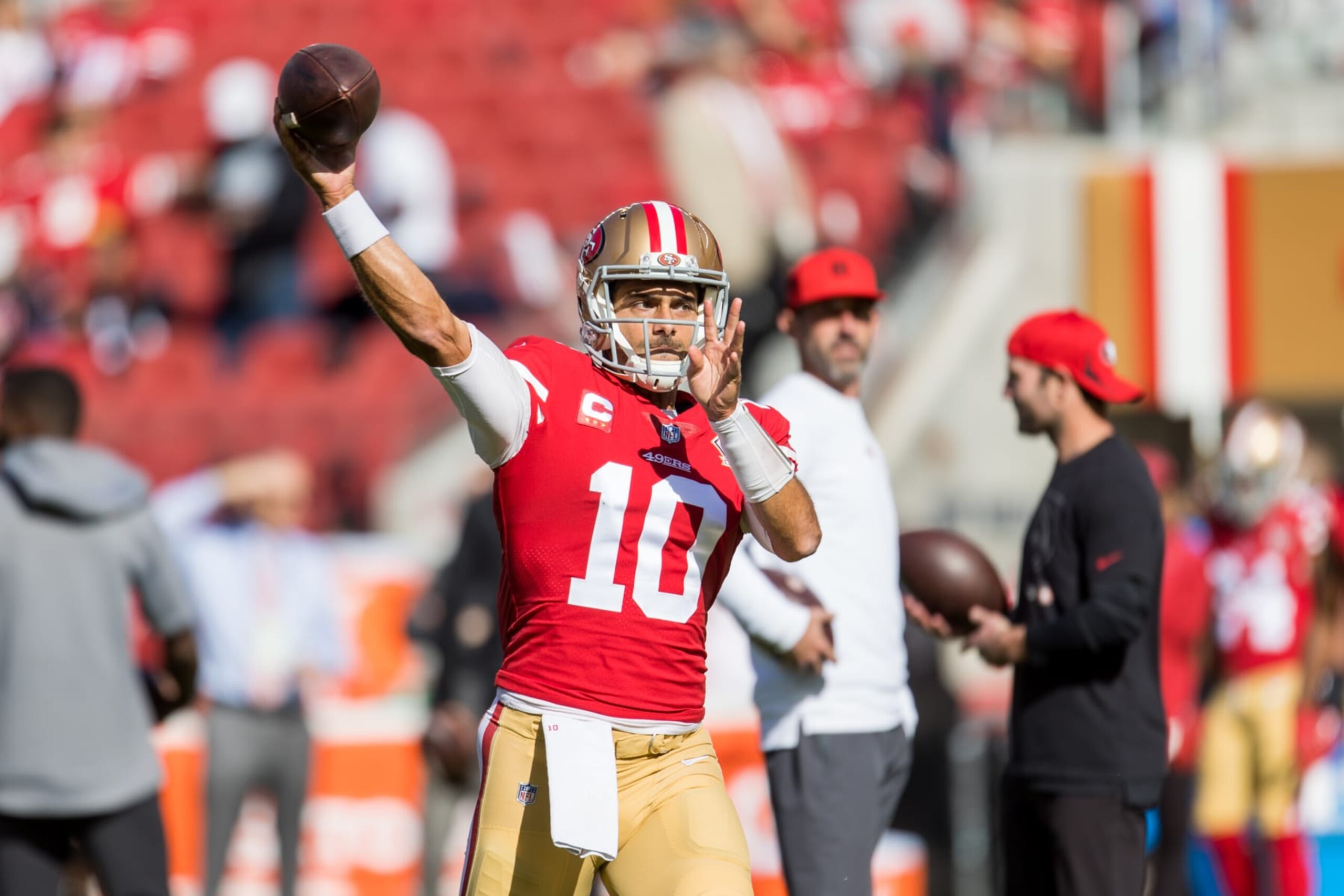 SANTA CLARA, CA - NOVEMBER 07: San Francisco 49ers Quarterback Jimmy Garoppolo (10) warms up while San Francisco 49ers head coach Kyle Shanahan watches before the NFL pro football game between the Arizona Cardinals and San Francisco 49ers on November 7, 2021 at Levis Stadium in Santa Clara, CA. (Photo by Bob Kupbens/Icon Sportswire via Getty Images)
