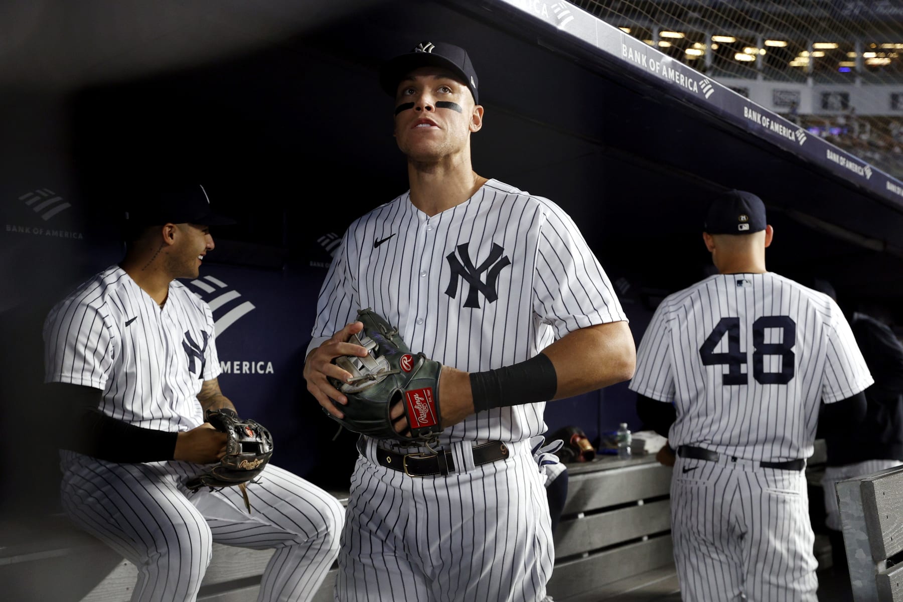 NEW YORK, NEW YORK - SEPTEMBER 22: Aaron Judge #99 of the New York Yankees looks on in the dugout before the first inning against the Boston Red Sox at Yankee Stadium on September 22, 2022 in the Bronx borough of New York City. (Photo by Sarah Stier/Getty Images)