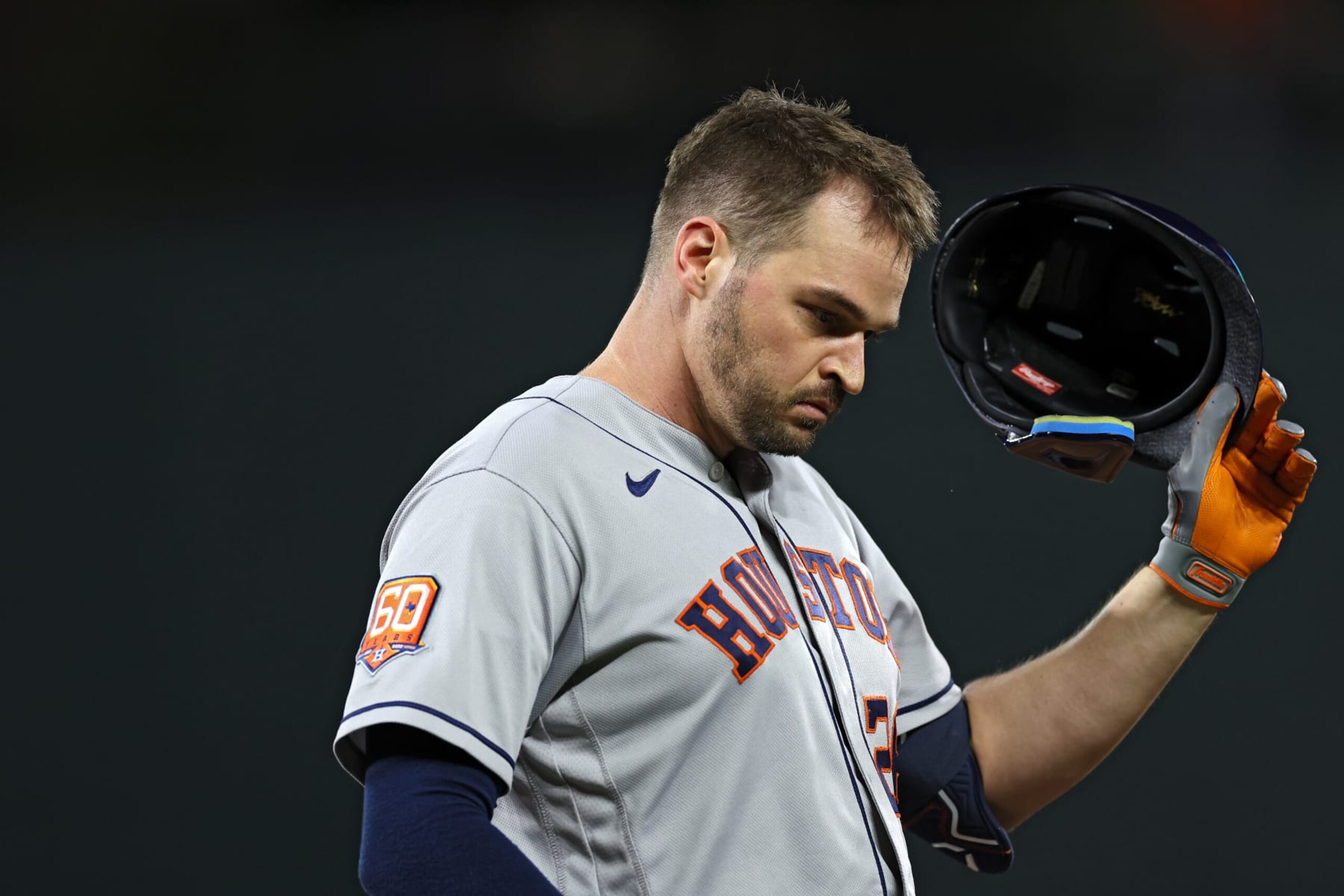 BALTIMORE, MARYLAND - SEPTEMBER 22: Trey Mancini #26 of the Houston Astros reacts after being forced out at first base against the Baltimore Orioles during the fifth inning at Oriole Park at Camden Yards on September 22, 2022 in Baltimore, Maryland. (Photo by Patrick Smith/Getty Images)