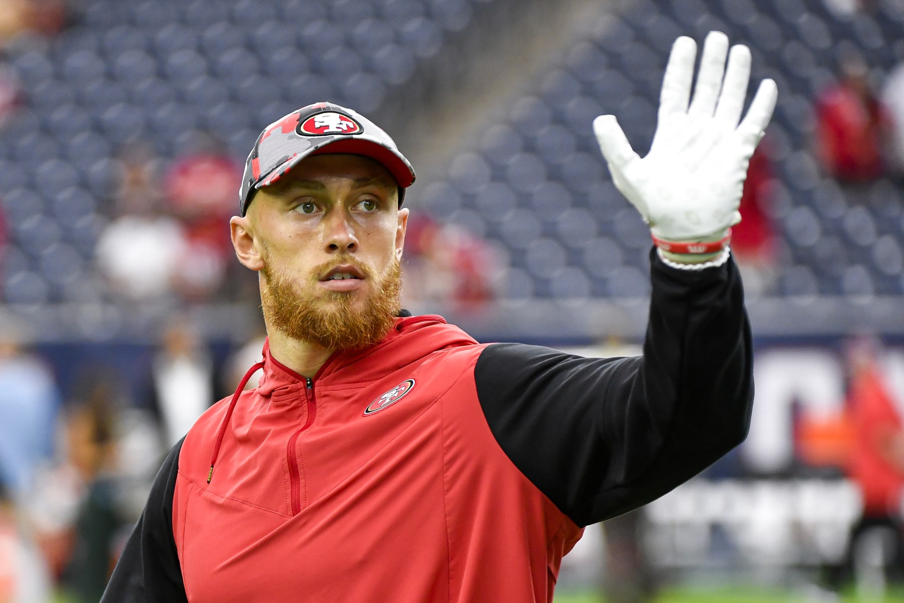 HOUSTON, TEXAS - AUGUST 25: George Kittle #85 of the San Francisco 49ers acknowledges fans prior to the preseason game at NRG Stadium against the Houston Texans on August 25, 2022 in Houston, Texas. (Photo by Logan Riely/Getty Images)