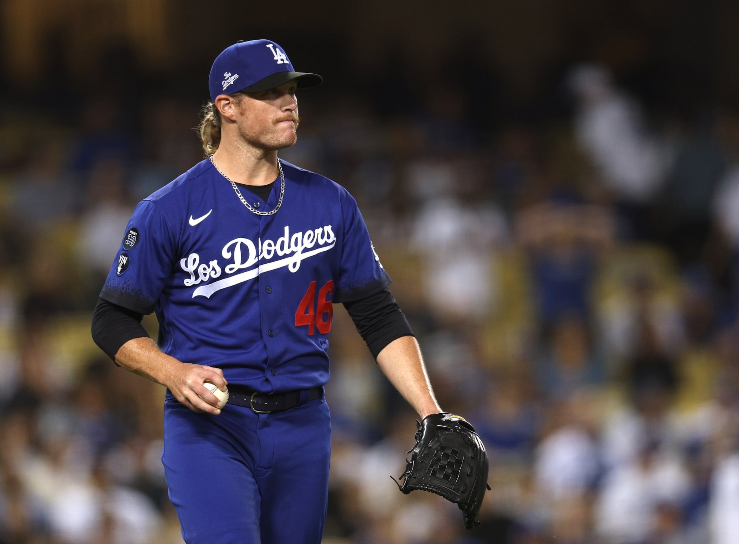 LOS ANGELES, CALIFORNIA - SEPTEMBER 22: Craig Kimbrel #46 of the Los Angeles Dodgers reacts to a Christian Walker #53 of the Arizona Diamondbacks solo homerun, to take a 2-1 lead, during the ninth inning at Dodger Stadium on September 22, 2022 in Los Angeles, California. (Photo by Harry How/Getty Images)