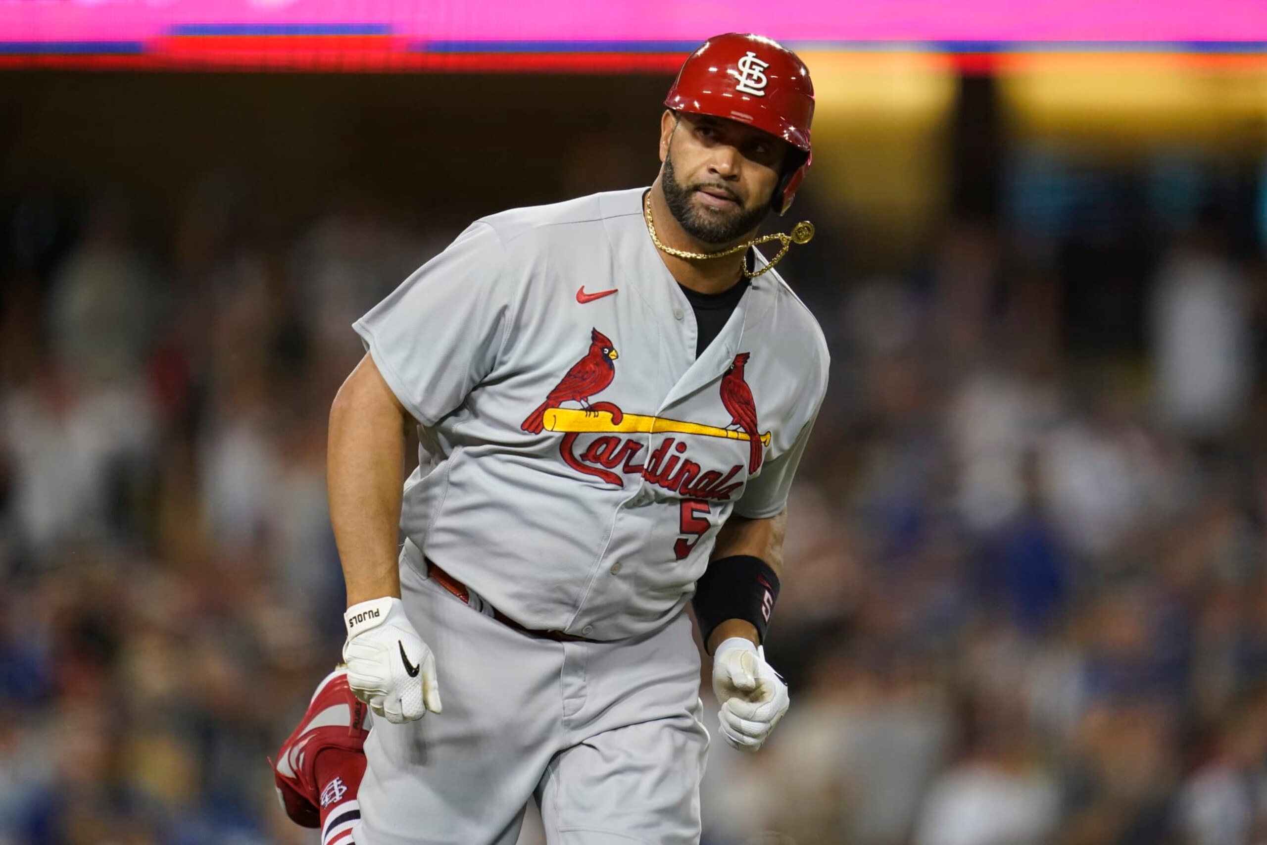 CORRECTS TO ST. LOUIS CARDINALS' ALBERT PUJOLS, INSTEAD OF LOS ANGELES DODGERS' FREDDIE FREEMAN - St. Louis Cardinals' Albert Pujols runs the bases after hitting a two-run home run during the third inning of a baseball game against the Los Angeles Dodgers in Los Angeles, Friday, Sept. 23, 2022. (AP Photo/Ashley Landis)