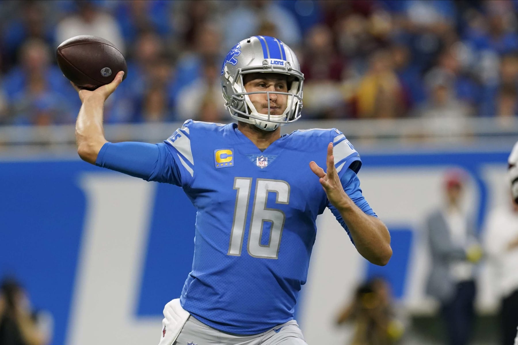Detroit Lions quarterback Jared Goff (16) throws a pas during the first half of an NFL football game against the Washington Commanders Sunday, Sept. 18, 2022, in Detroit. (AP Photo/Paul Sancya)