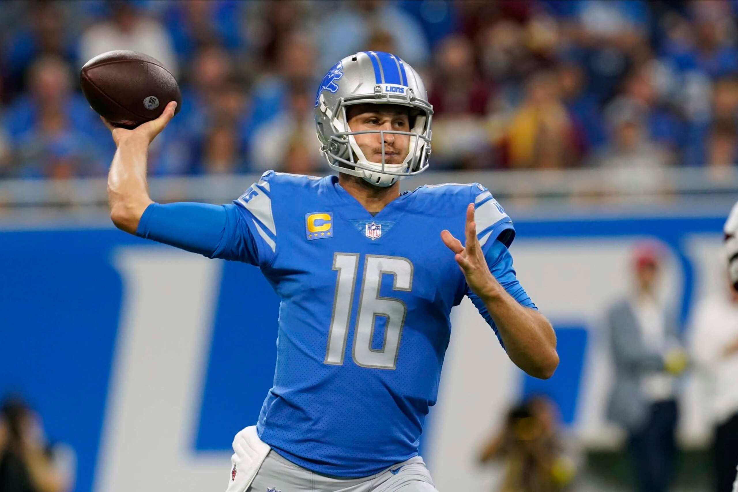 Detroit Lions quarterback Jared Goff (16) throws a pas during the first half of an NFL football game against the Washington Commanders Sunday, Sept. 18, 2022, in Detroit. (AP Photo/Paul Sancya)