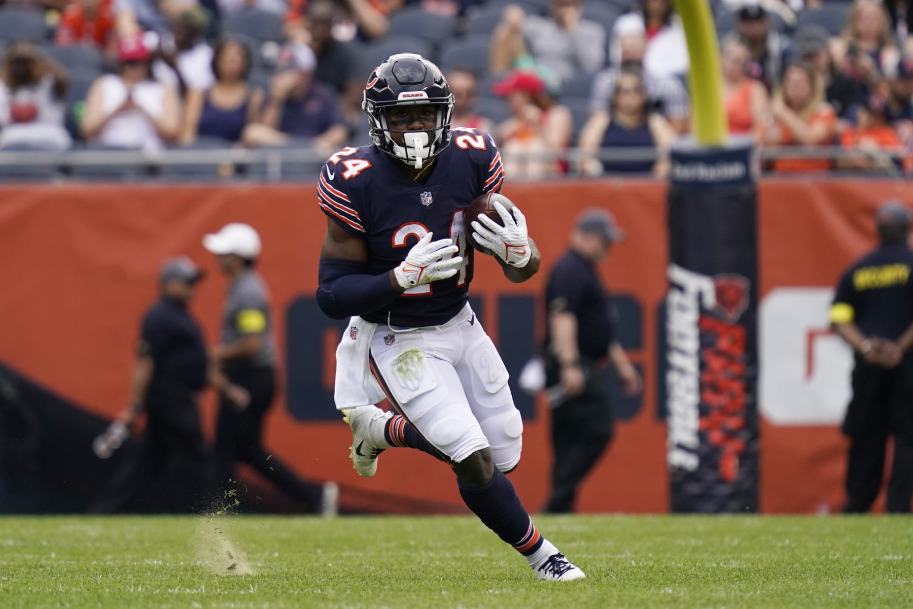 Chicago Bears running back Khalil Herbert runs with the ball against the Kansas City Chiefs during the first half of a preseason NFL football game Saturday, Aug. 13, 2022, in Chicago.(AP Photo/Nam Y. Huh)