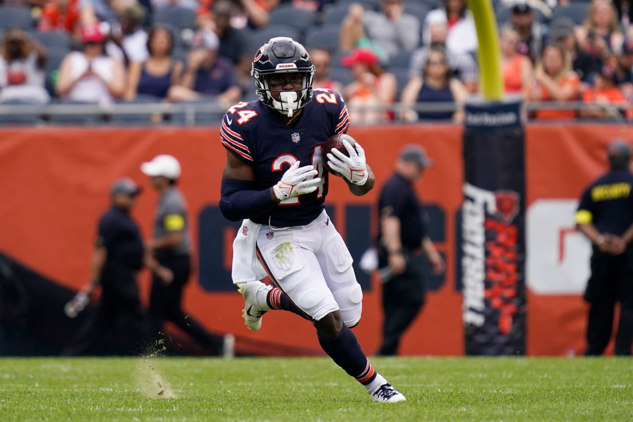 Chicago Bears running back Khalil Herbert runs with the ball against the Kansas City Chiefs during the first half of a preseason NFL football game Saturday, Aug. 13, 2022, in Chicago.(AP Photo/Nam Y. Huh)
