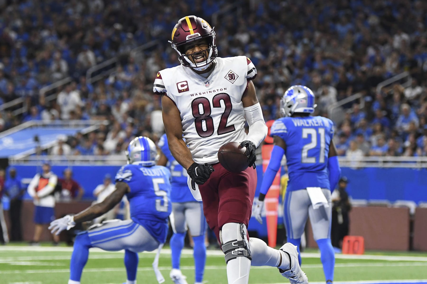 Washington Commanders tight end Logan Thomas (82) celebrates a touchdown reception during the second half of an NFL football game against the Detroit Lions Sunday, Sept. 18, 2022, in Detroit. (AP Photo/Lon Horwedel)