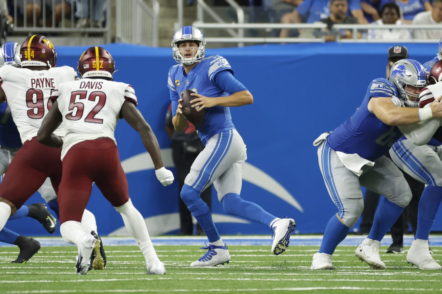 Detroit Lions quarterback Jared Goff (16) drops back to pass against the Washington Commanders during an NFL football game, Sunday, Sept. 18, 2022, in Detroit. (AP Photo/Rick Osentoski)