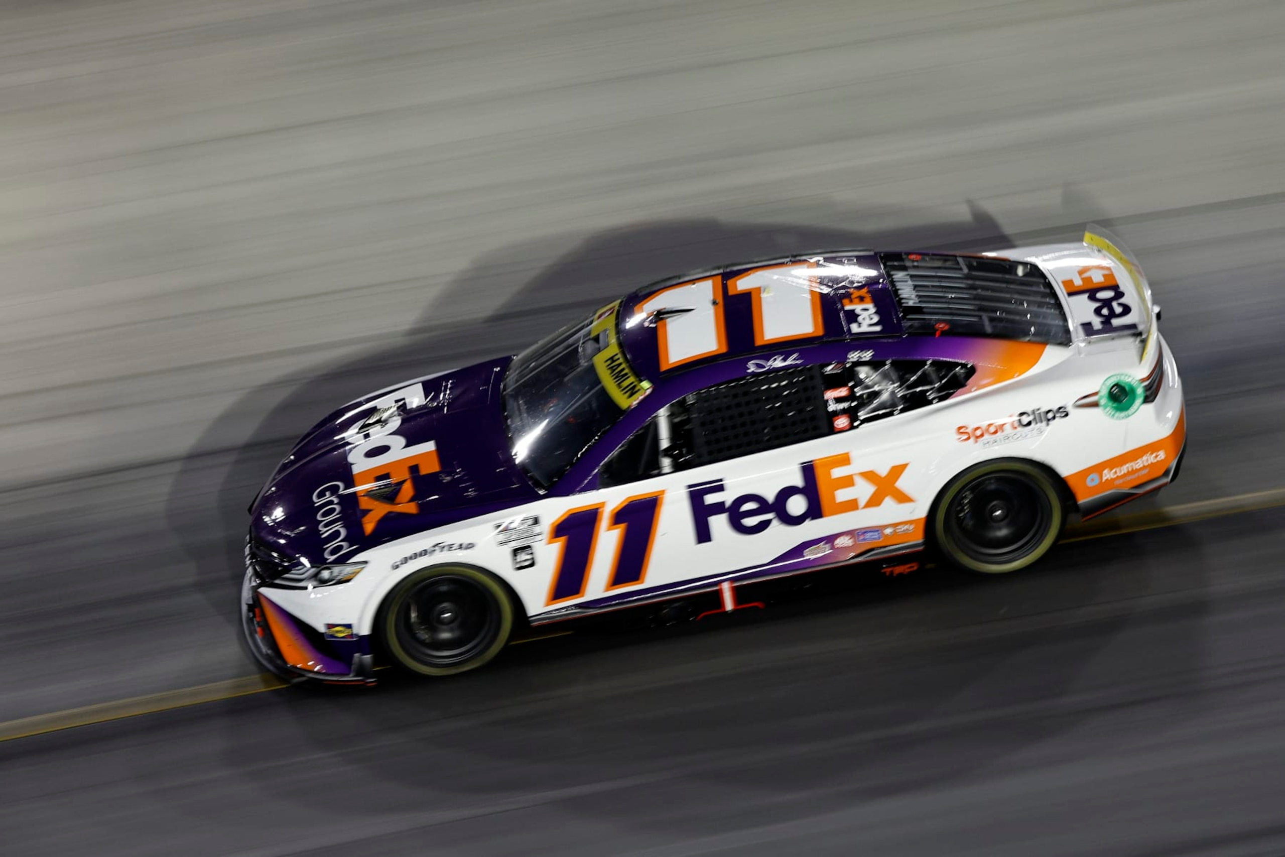 BRISTOL, TENNESSEE - SEPTEMBER 17: Denny Hamlin, driver of the #11 FedEx Ground Toyota, drives during the NASCAR Cup Series Bass Pro Shops Night Race at Bristol Motor Speedway on September 17, 2022 in Bristol, Tennessee. (Photo by Sean Gardner/Getty Images)