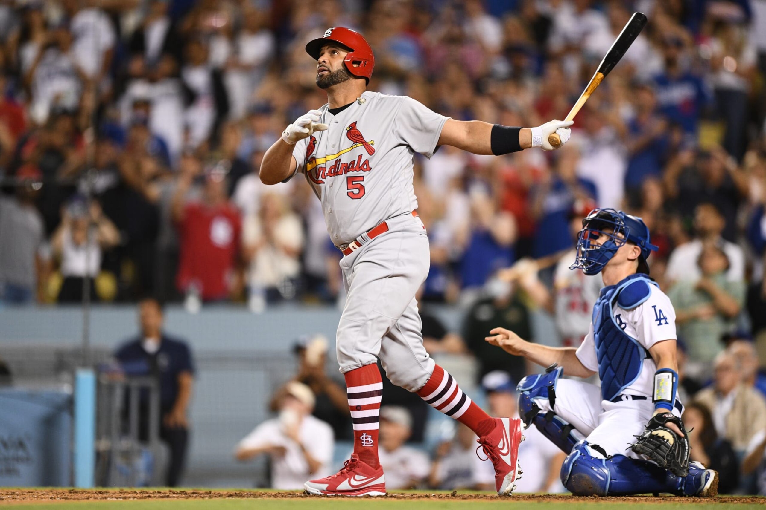 LOS ANGELES, CA - SEPTEMBER 23: St. Louis Cardinals designated hitter Albert Pujols (5) hits career home run number 700 as a three run home run in the 4th inning of the MLB game between the St. Louis Cardinals and the Los Angeles Dodgers on September 23, 2022 at Dodger Stadium in Los Angeles, CA. (Photo by Brian Rothmuller/Icon Sportswire via Getty Images)