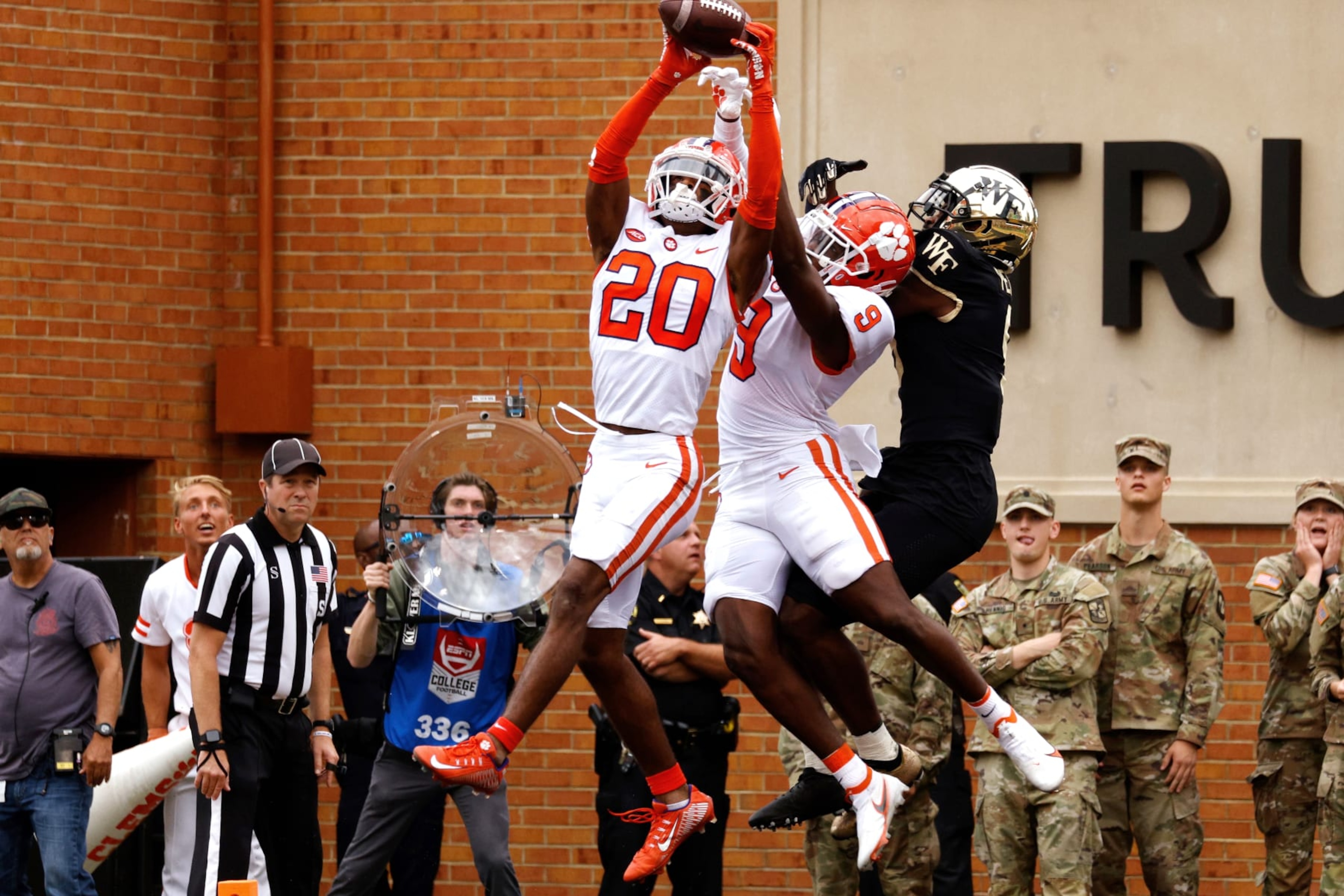 WINSTON-SALEM, NC - SEPTEMBER 24: Nate Wiggins #20 of the Clemson Tigers breaks up a pass intended for A.T. Perry #9 of the Wake Forest Demon Deacons to end the game in the second overtime at Truist Field on September 24, 2022 in Winston-Salem, North Carolina. Clemson won 51-45 in 2OT. (Photo by Lance King/Getty Images)