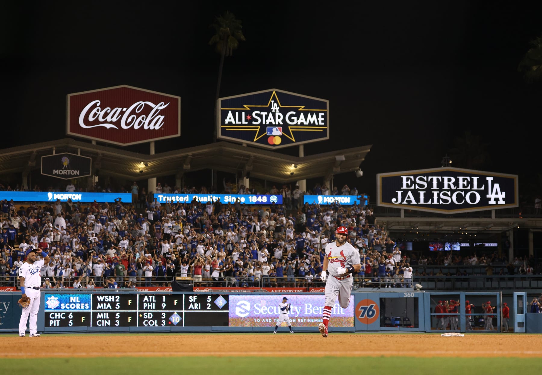 LOS ANGELES, CALIFORNIA - SEPTEMBER 23: Albert Pujols #5 of the St. Louis Cardinals reacts as he runs the bases after hitting his 700th career homerun, a three run homerun to take a 5-0 lead over the Los Angeles Dodgers during the fourth inning at Dodger Stadium on September 23, 2022 in Los Angeles, California. (Photo by Harry How/Getty Images)