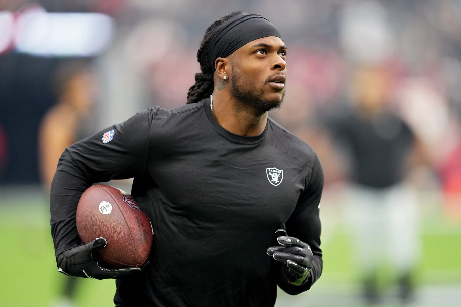 LAS VEGAS, NEVADA - SEPTEMBER 18: Davante Adams #17 of the Las Vegas Raiders warms up before a game against the Arizona Cardinals at Allegiant Stadium on September 18, 2022 in Las Vegas, Nevada. (Photo by Chris Unger/Getty Images)