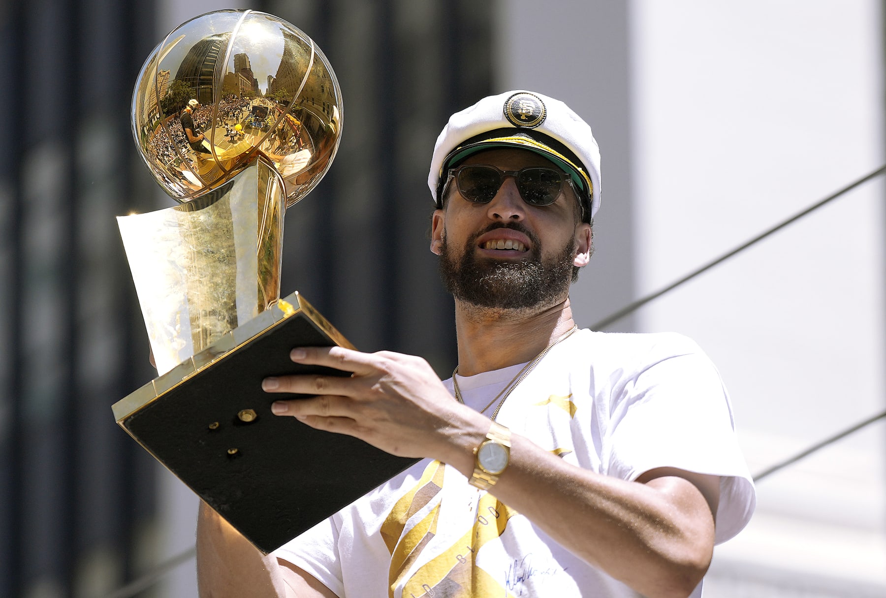 SAN FRANCISCO, CALIFORNIA - JUNE 20: Klay Thompson #11 of the Golden State Warriors celebrates with the NBA Championship Trophy during the Golden State Warriors Victory Parade on June 20, 2022 in San Francisco, California. The Golden State Warriors beat the Boston Celtics 4-2 to win the 2022 NBA Finals. NOTE TO USER: User expressly acknowledges and agrees that, by downloading and or using this photograph, User is consenting to the terms and conditions of the Getty Images License Agreement. (Photo by Thearon W. Henderson/Getty Images)(Photo by Thearon W. Henderson/Getty Images)