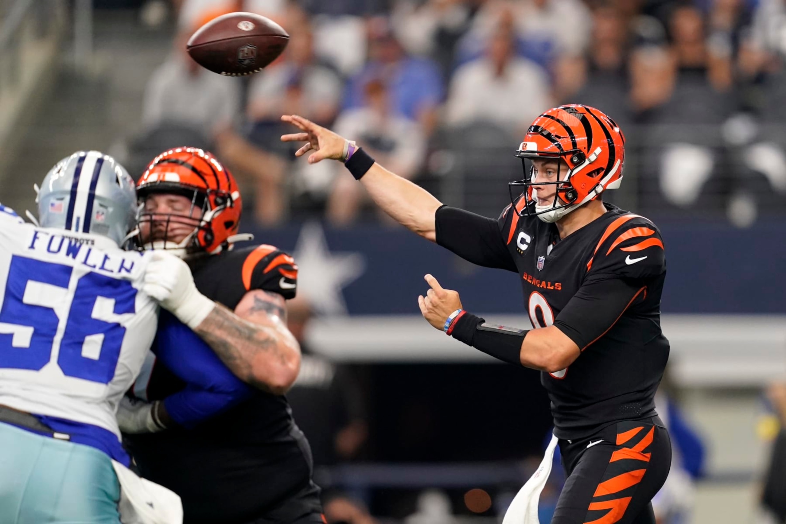 Dallas Cowboys defensive end Dante Fowler Jr. (56) rushes as Cincinnati Bengals quarterback Joe Burrow throws a pass during a NFL football game in Arlington, Texas, Sunday, Sept. 17, 2022. (AP Photo/Tony Gutierrez) Dallas Cowboys defensive end Dante Fowler Jr. (56) rushes as Cincinnati Bengals quarterback Joe Burrow throws a pass during a NFL football game in Arlington, Texas, Sunday, Sept. 17, 2022. (AP Photo/Tony Gutierrez)