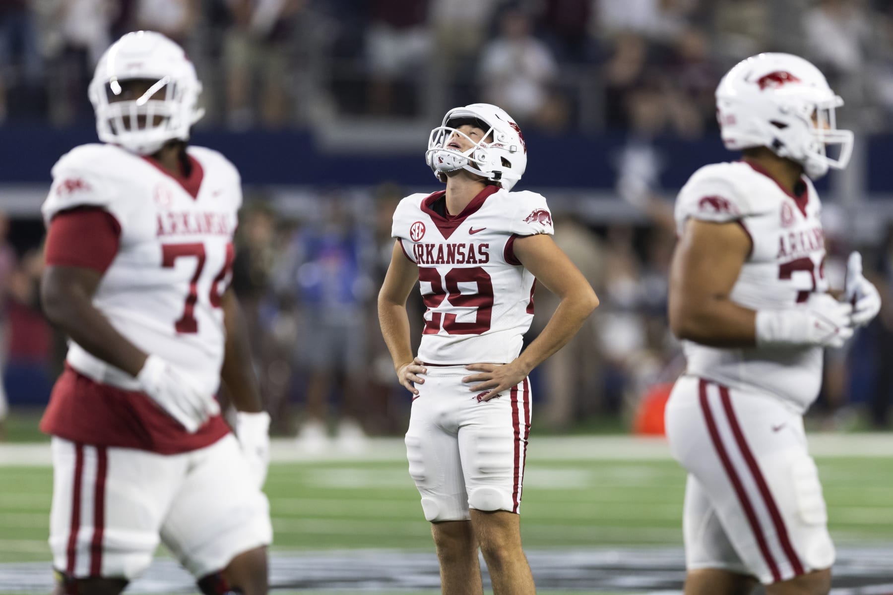 Arkansas place-kicker Cam Little (29) reacts after missing a field goal during the closing minutes of the team's NCAA college football game against Texas A&M on Saturday, Sept. 24, 2022, in Arlington, Texas. Texas A&M won 23-21. (AP Photo/Brandon Wade)