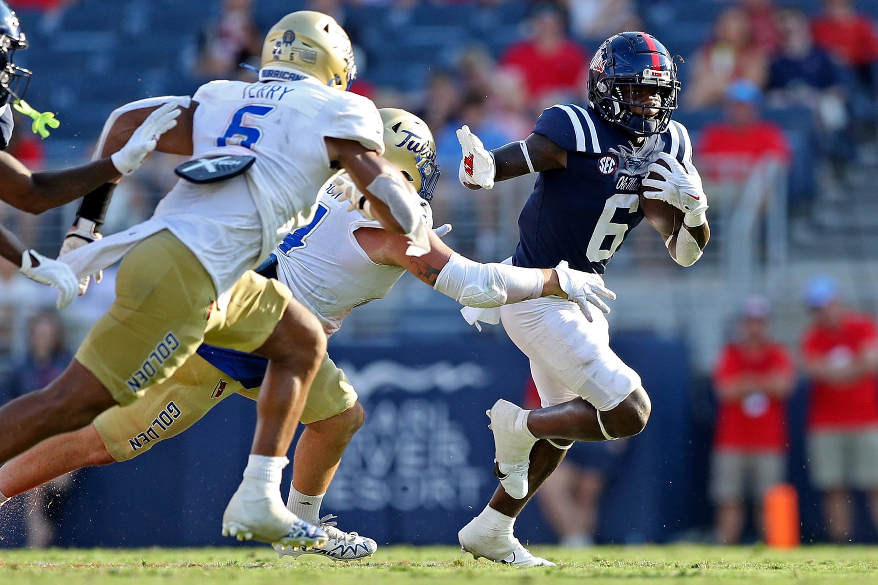 OXFORD, MISSISSIPPI - SEPTEMBER 24: Zach Evans #6 of the Mississippi Rebels carries the ball during the second half against the Tulsa Golden Hurricane at Vaught-Hemingway Stadium on September 24, 2022 in Oxford, Mississippi. (Photo by Justin Ford/Getty Images)