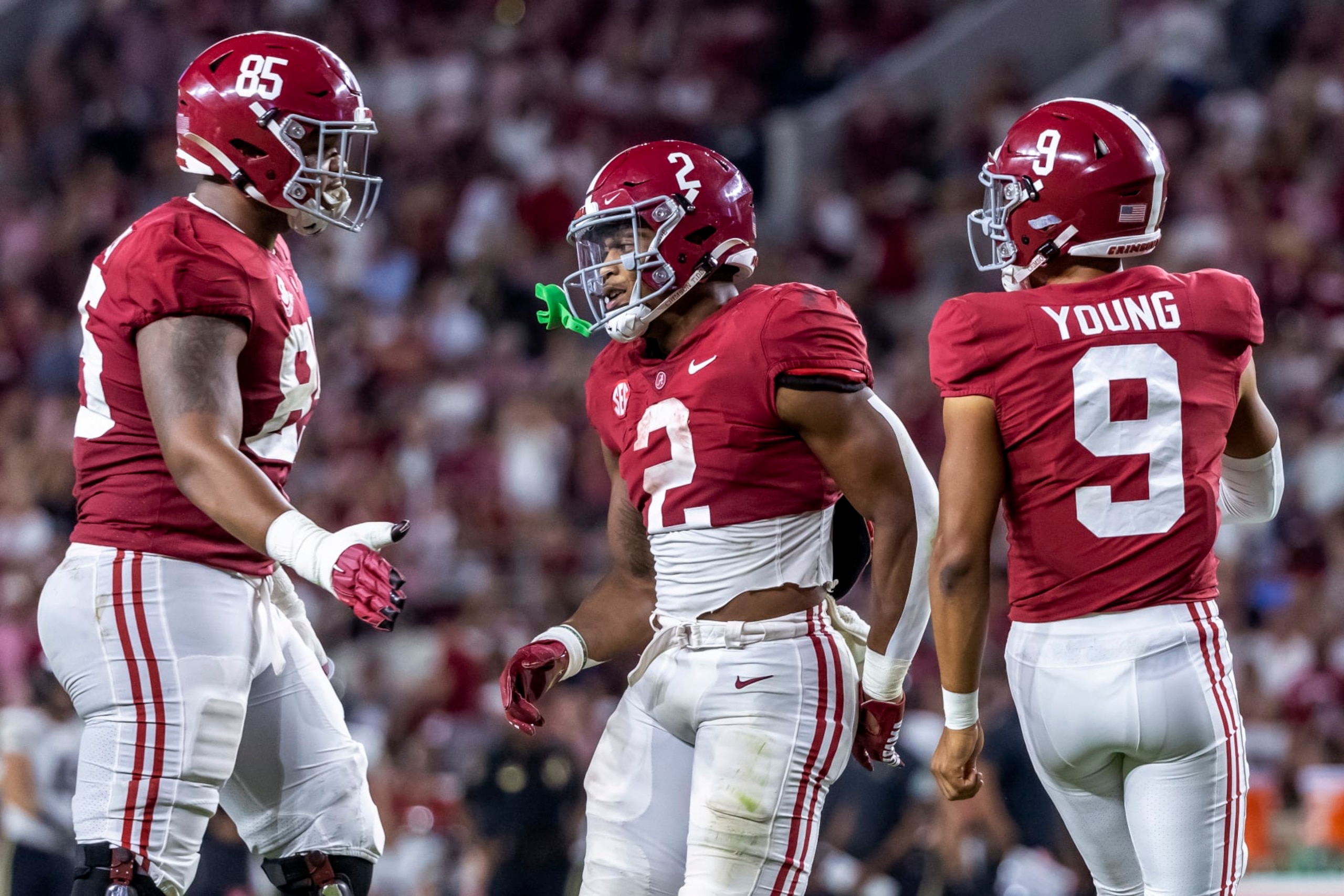 Alabama tight end Elijah Brown (85) and quarterback Bryce Young (9) greet running back Jase McClellan (2) after his touchdown against Vanderbilt during the second half of an NCAA college football game Saturday, Sept. 24, 2022, in Tuscaloosa, Ala. (AP Photo/Vasha Hunt)