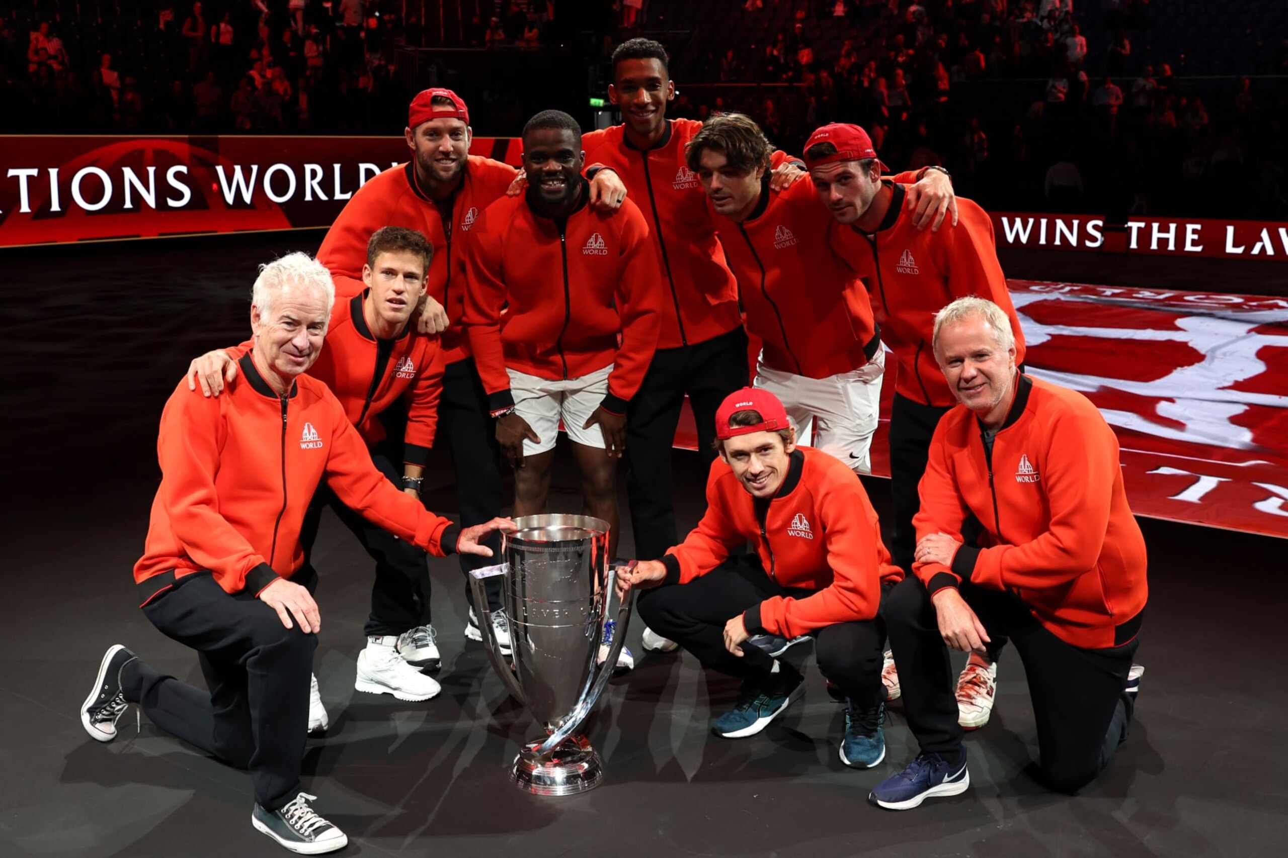 LONDON, ENGLAND - SEPTEMBER 25: Players of Team World celebrate with the Laver Cup trophy during Day Three of the Laver Cup at The O2 Arena on September 25, 2022 in London, England. (Photo by Clive Brunskill/Getty Images for Laver Cup)