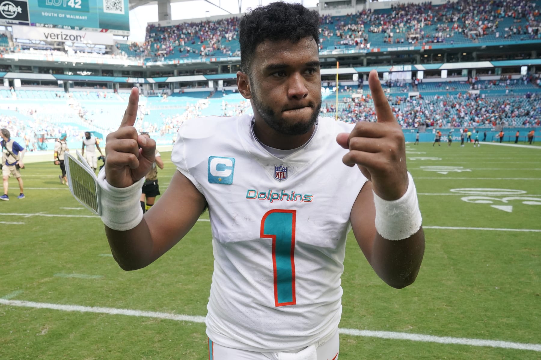 Miami Dolphins quarterback Tua Tagovailoa (1) gestures at the end of an NFL football game against the Buffalo Bills, Sunday, Sept. 25, 2022, in Miami Gardens, Fla. The Dolphins defeated the Bills 21-19. (AP Photo/Wilfredo Lee )