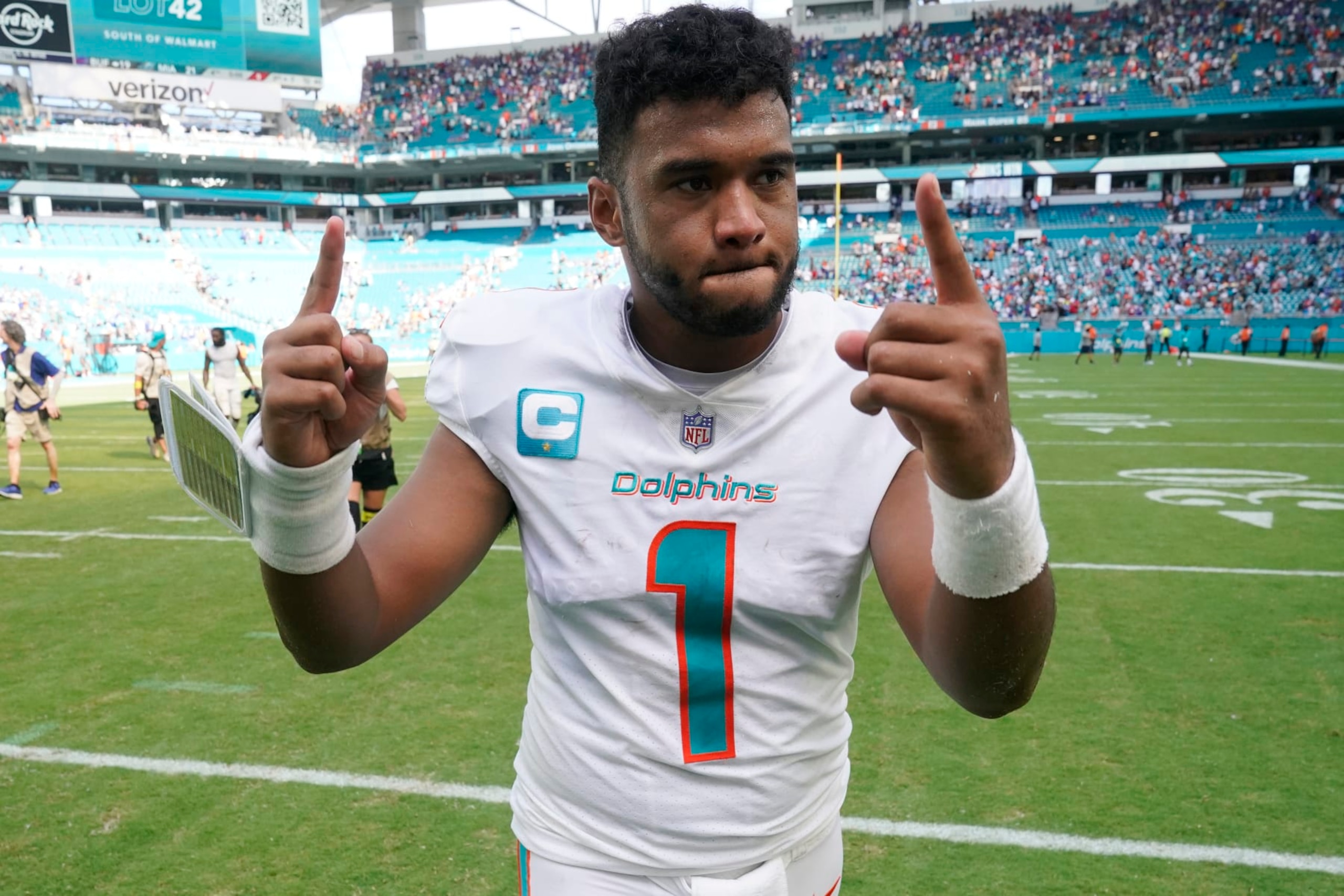 Miami Dolphins quarterback Tua Tagovailoa (1) gestures at the end of an NFL football game against the Buffalo Bills, Sunday, Sept. 25, 2022, in Miami Gardens, Fla. The Dolphins defeated the Bills 21-19. (AP Photo/Wilfredo Lee )