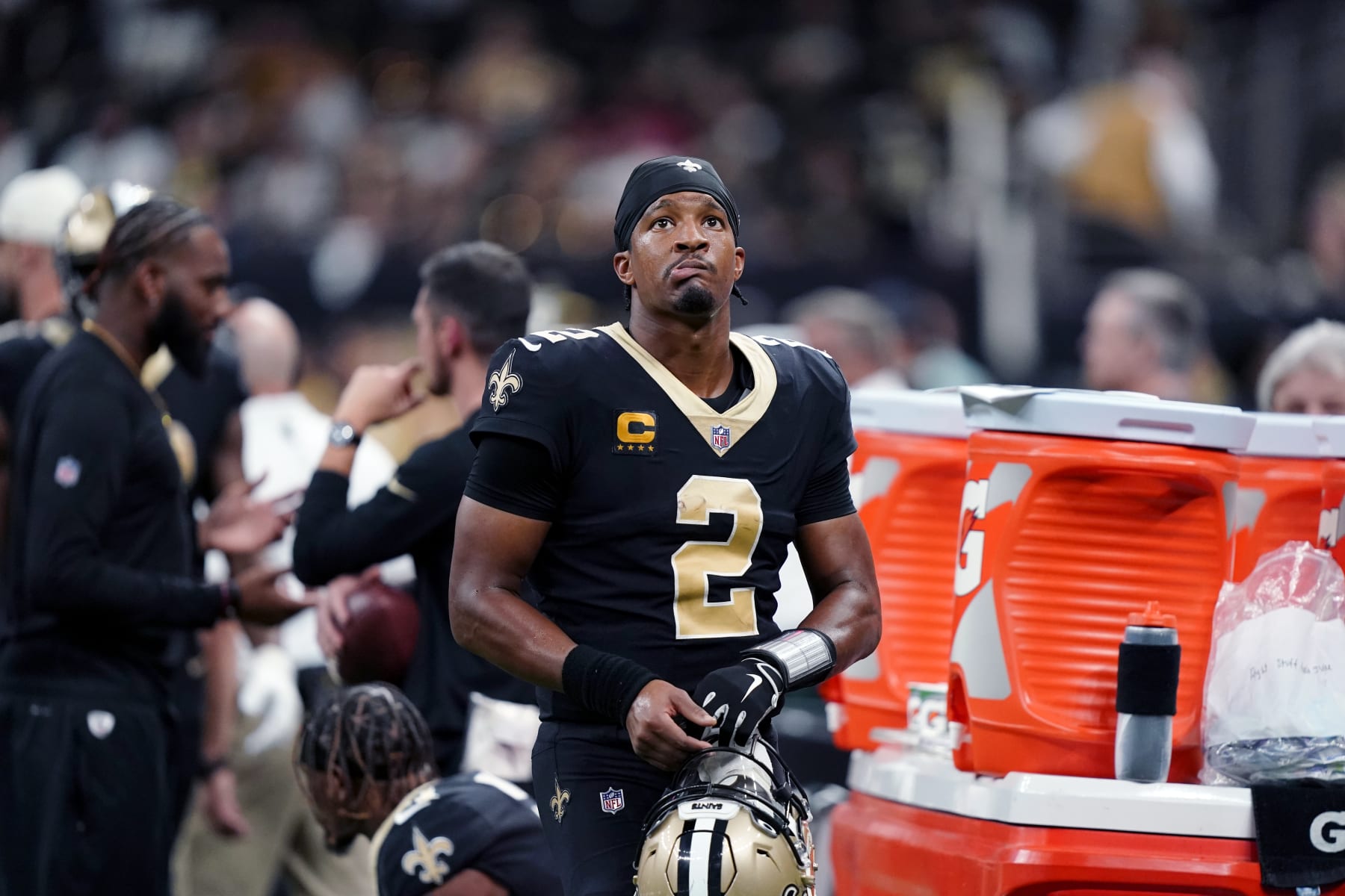 New Orleans Saints quarterback Jameis Winston (2) walks on the sideline after his pass was fumbled then recovered by the Tampa Bay Buccaneers in the second half of an NFL football game in New Orleans, Sunday, Sept. 18, 2022. (AP Photo/Gerald Herbert)