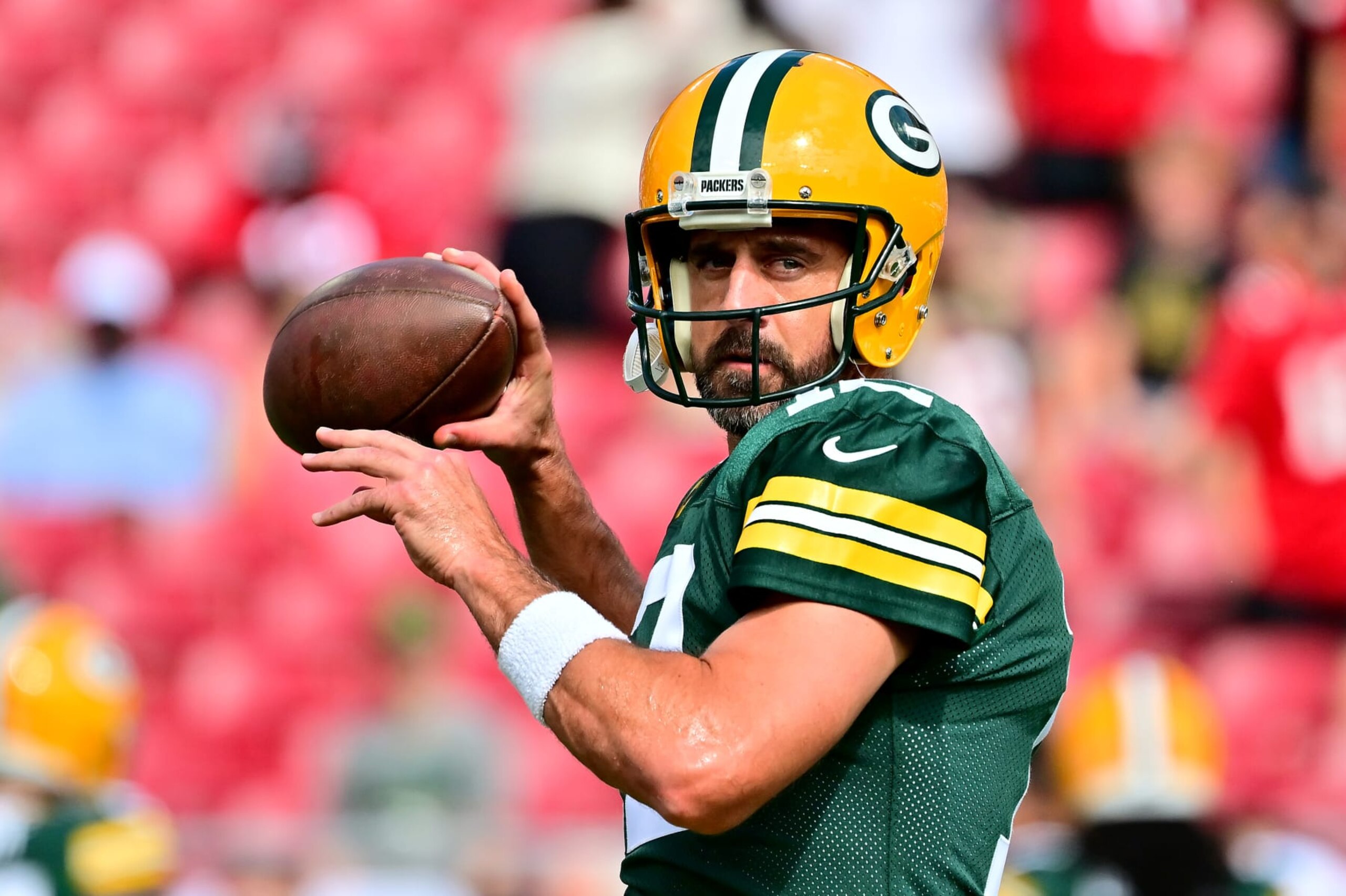 TAMPA, FLORIDA - SEPTEMBER 25: Aaron Rodgers #12 of the Green Bay Packers warms up prior to the game against the Tampa Bay Buccaneers at Raymond James Stadium on September 25, 2022 in Tampa, Florida. (Photo by Julio Aguilar/Getty Images)