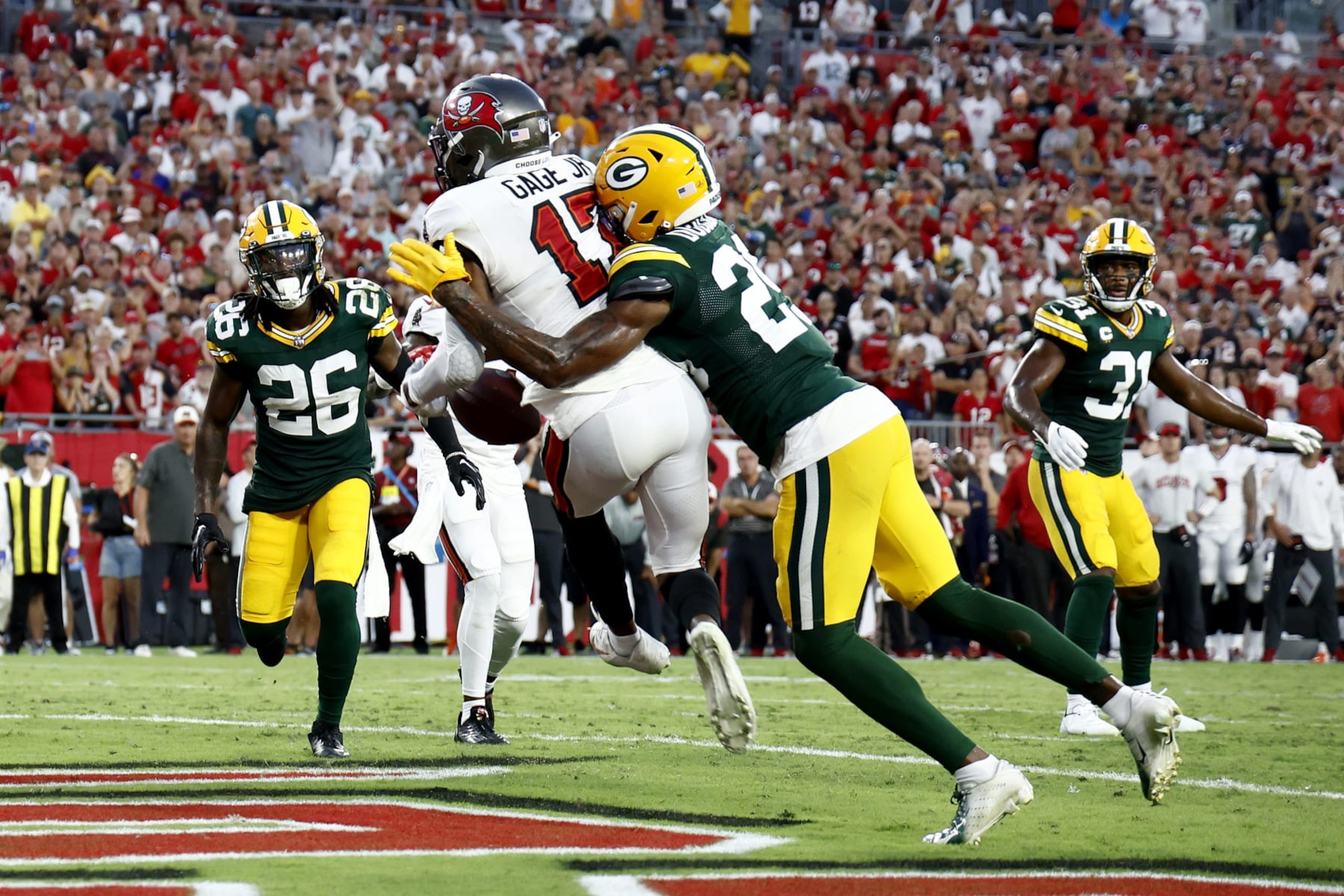 TAMPA, FLORIDA - SEPTEMBER 25: Russell Gage #17 of the Tampa Bay Buccaneers scores a touchdown against the Green Bay Packers during the fourth quarter in the game at Raymond James Stadium on September 25, 2022 in Tampa, Florida. (Photo by Douglas P. DeFelice/Getty Images)