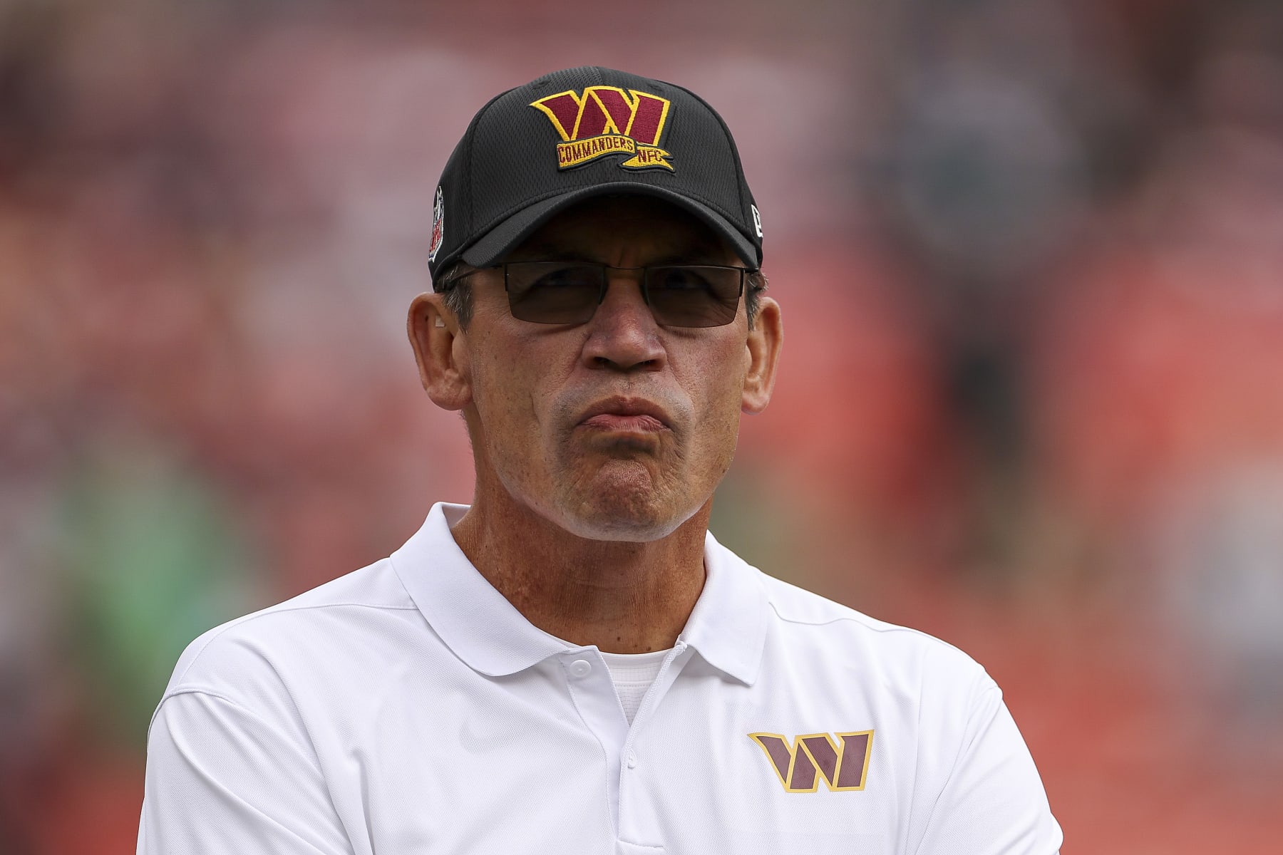 LANDOVER, MARYLAND - SEPTEMBER 25: Head coach Ron Rivera of the Washington Commanders looks onward during pregame at FedExField on September 25, 2022 in Landover, Maryland. (Photo by Scott Taetsch/Getty Images)