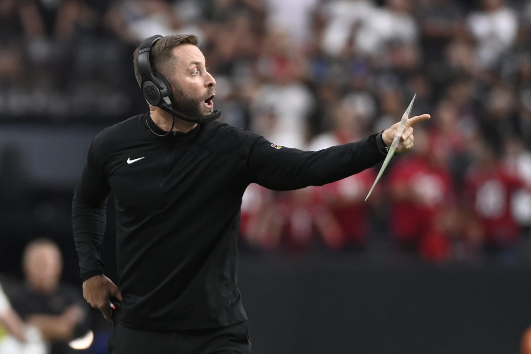 Arizona Cardinals head coach Kliff Kingsbury calls to to his team during an NFL football game against the Las Vegas Raiders, Sunday, Sep 18, 2022, in Las Vegas. (AP Photo/David Becker)
