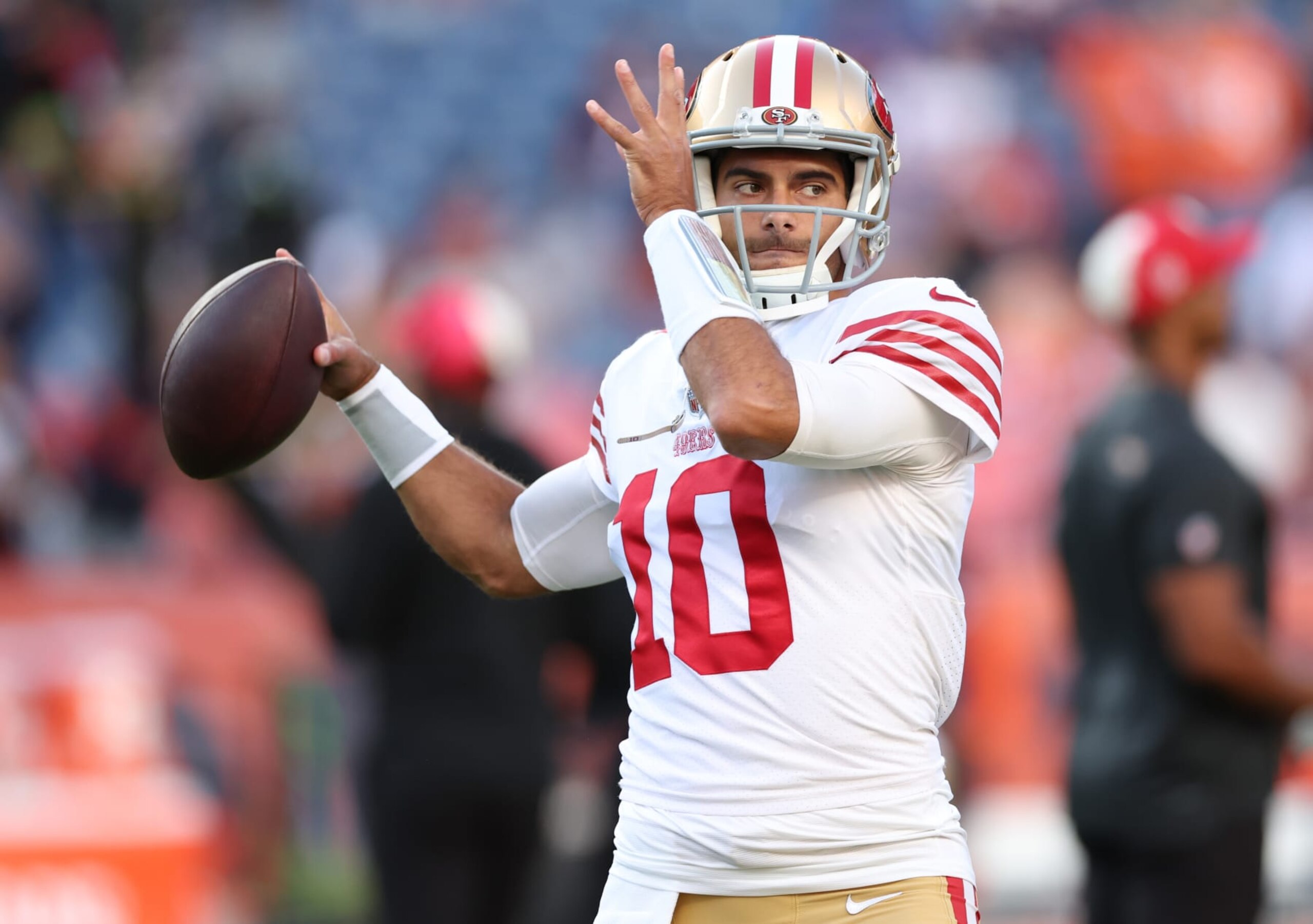 DENVER, COLORADO - SEPTEMBER 25:  Jimmy Garoppolo #10 of the San Francisco 49ers warms up prior to the game against the Denver Broncos at Empower Field At Mile High on September 25, 2022 in Denver, Colorado. (Photo by Matthew Stockman/Getty Images)