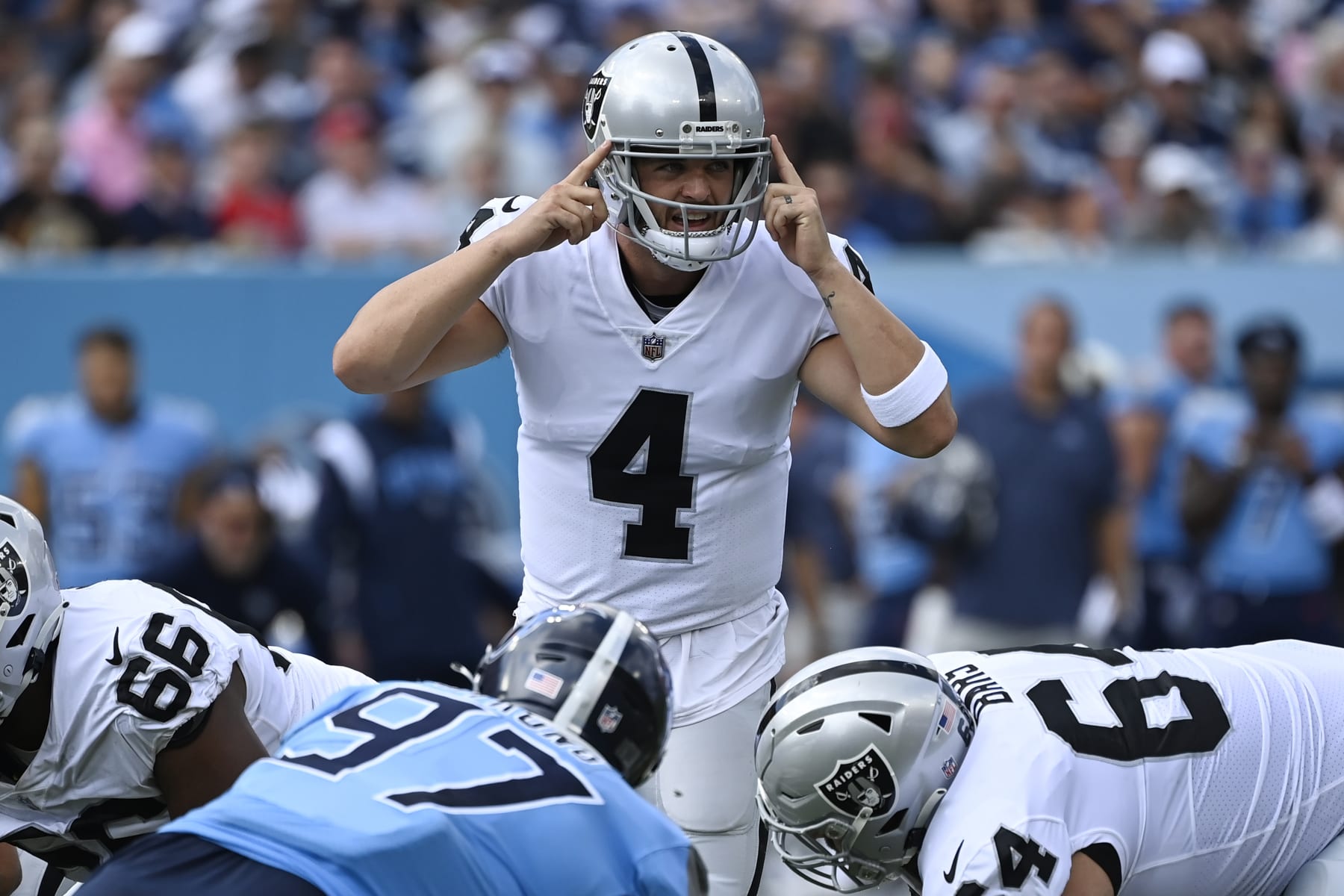 Las Vegas Raiders quarterback Derek Carr (4) calls a play during the first half of an NFL football game against the Tennessee Titans Sunday, Sept. 25, 2022, in Nashville. (AP Photo/Mark Zaleski)