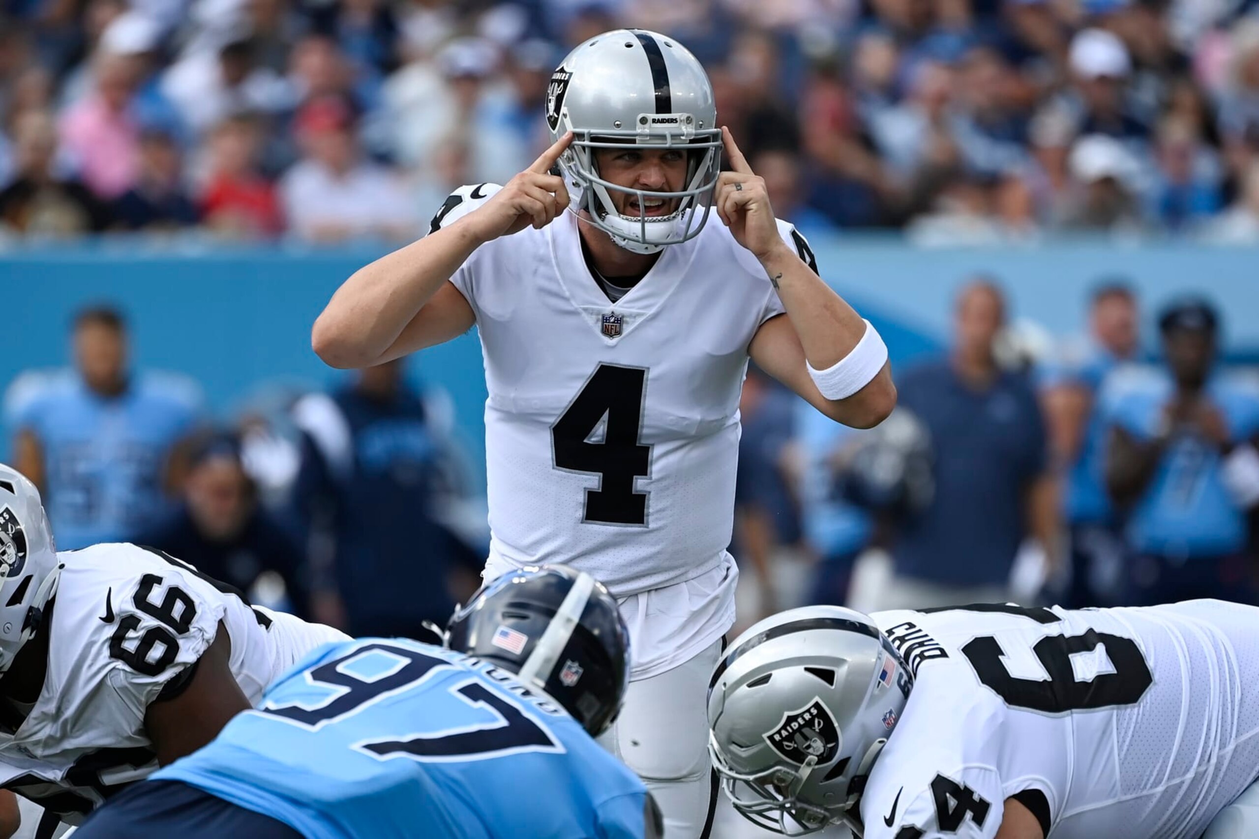 Las Vegas Raiders quarterback Derek Carr (4) calls a play during the first half of an NFL football game against the Tennessee Titans Sunday, Sept. 25, 2022, in Nashville. (AP Photo/Mark Zaleski)