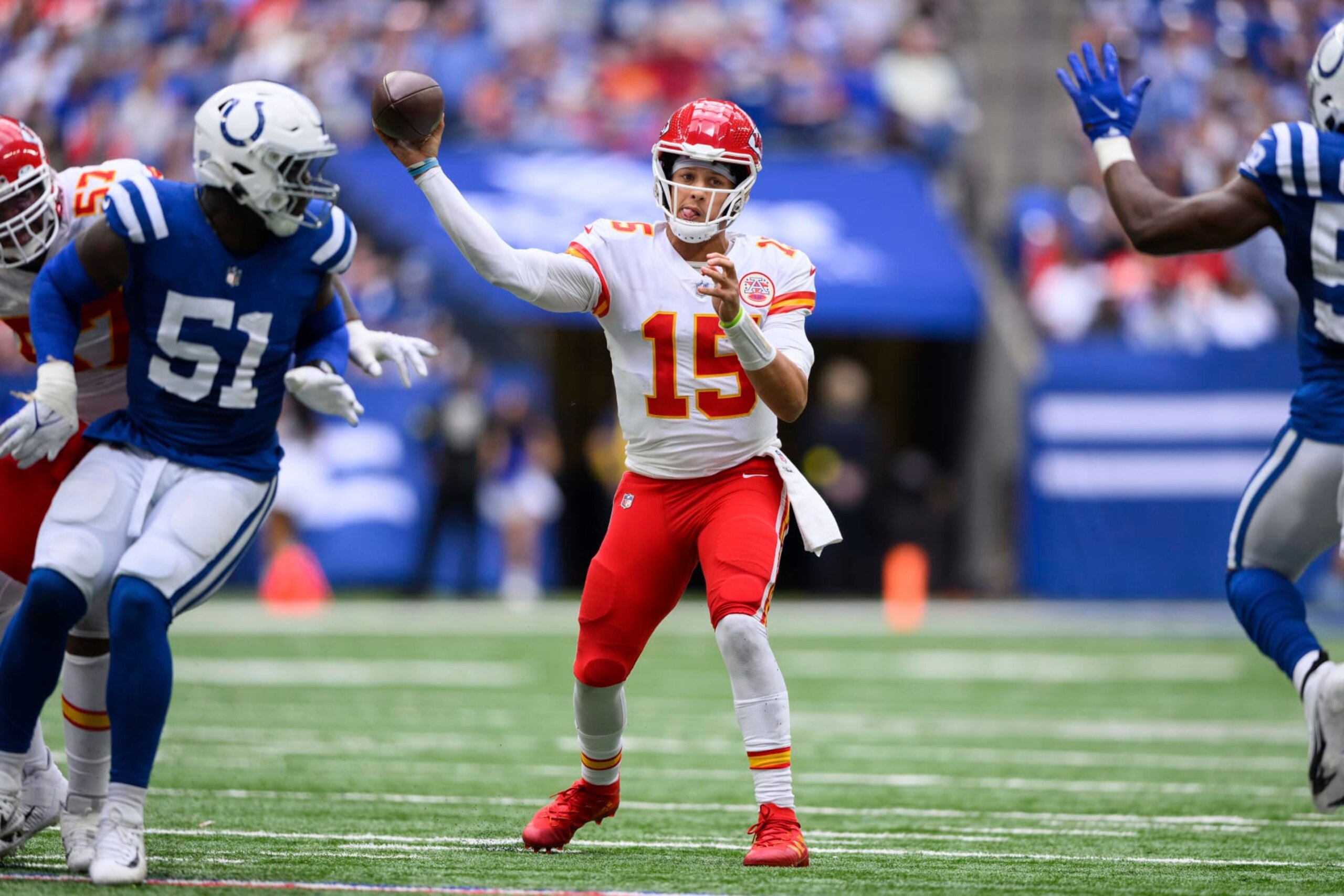 Kansas City Chiefs quarterback Patrick Mahomes (15) throws downfield during an NFL football game against the Indianapolis Colts, Sunday, Sept. 25, 2022, in Indianapolis. (AP Photo/Zach Bolinger)
