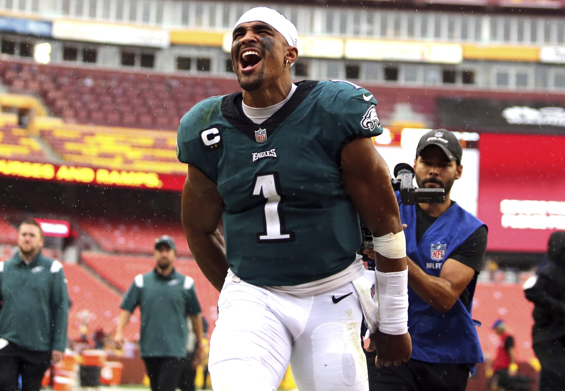 Philadelphia Eagles quarterback Jalen Hurts (1) celebrates after an NFL football game against the Washington Commanders, Sunday, Sept. 25, 2022 in Landover. (AP Photo/Daniel Kucin Jr.)