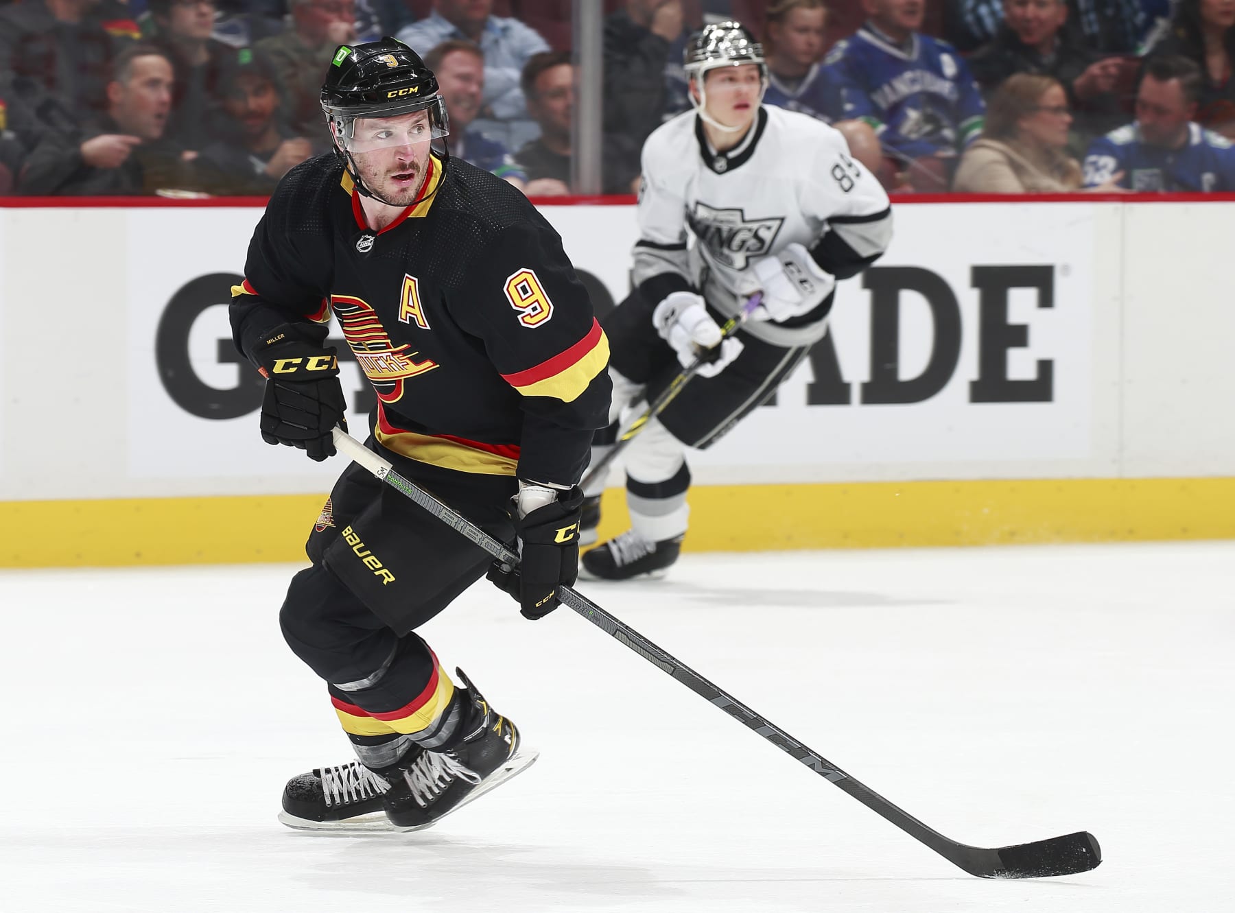 VANCOUVER, BC - APRIL 28: J.T. Miller #9 of the Vancouver Canucks skates up ice during their NHL game against the Los Angeles Kings at Rogers Arena April 28, 2022 in Vancouver, British Columbia, Canada.  (Photo by Jeff Vinnick/NHLI via Getty Images)"n